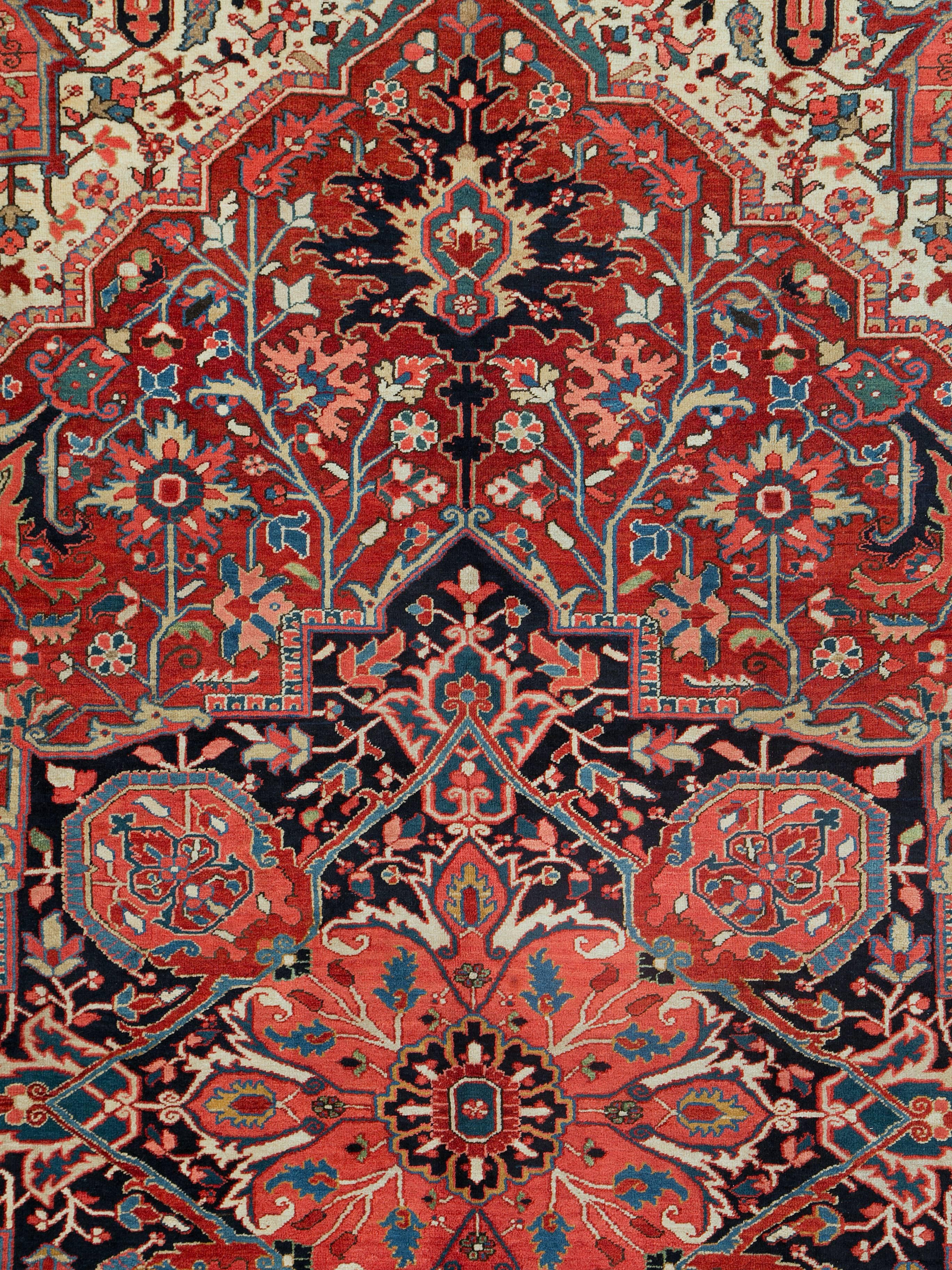A vintage Persian Heriz carpet from the second quarter of the 20th century.