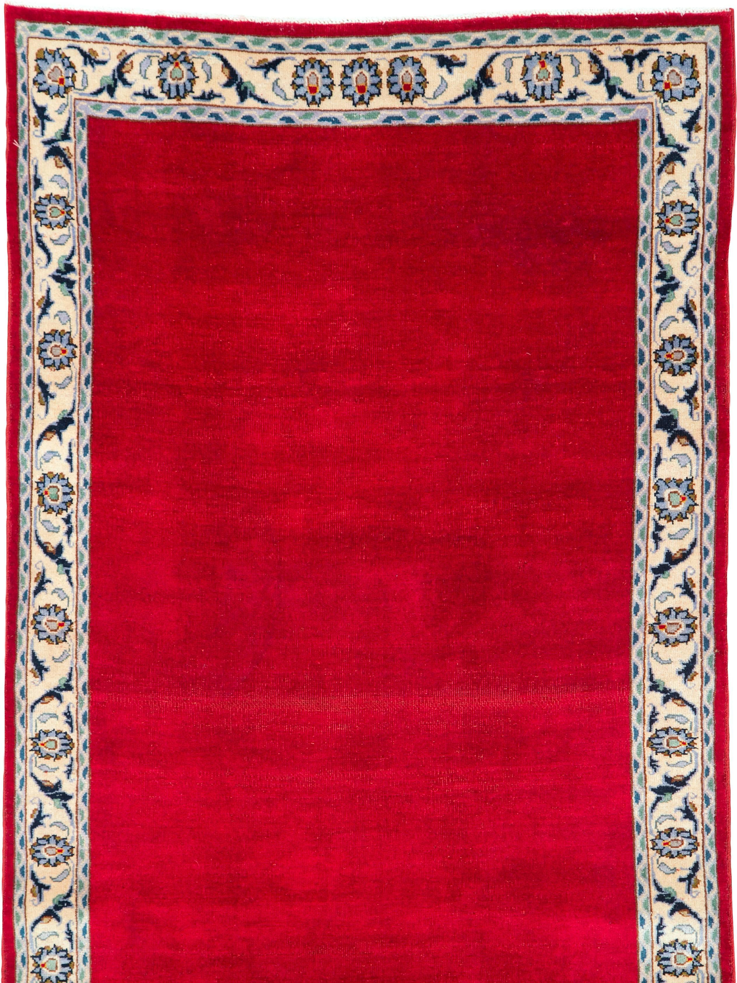 A vintage Persian Kashan modernist carpet from the mid-20th century.