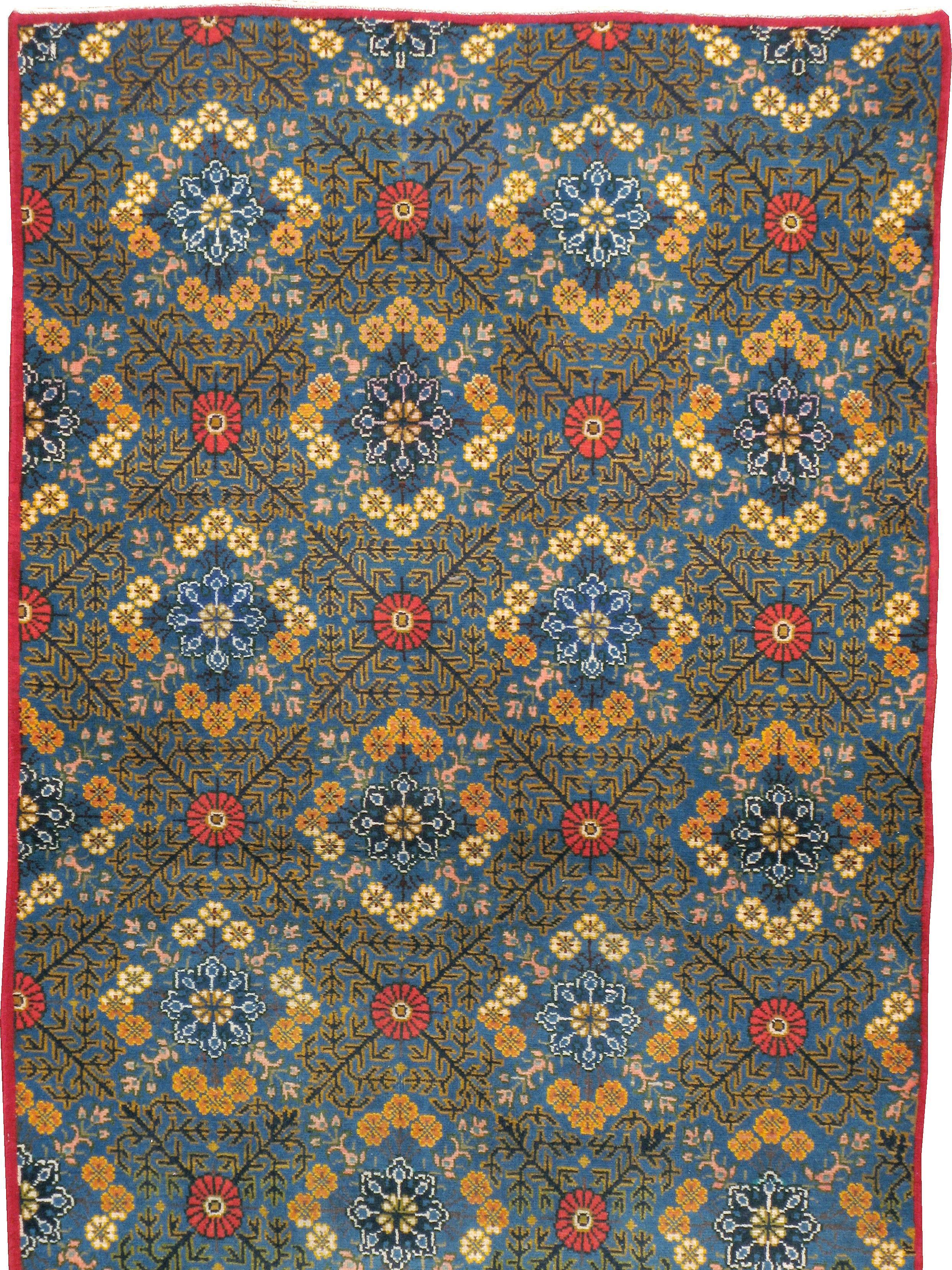 A vintage Persian Kashan carpet from the mid-20th century.