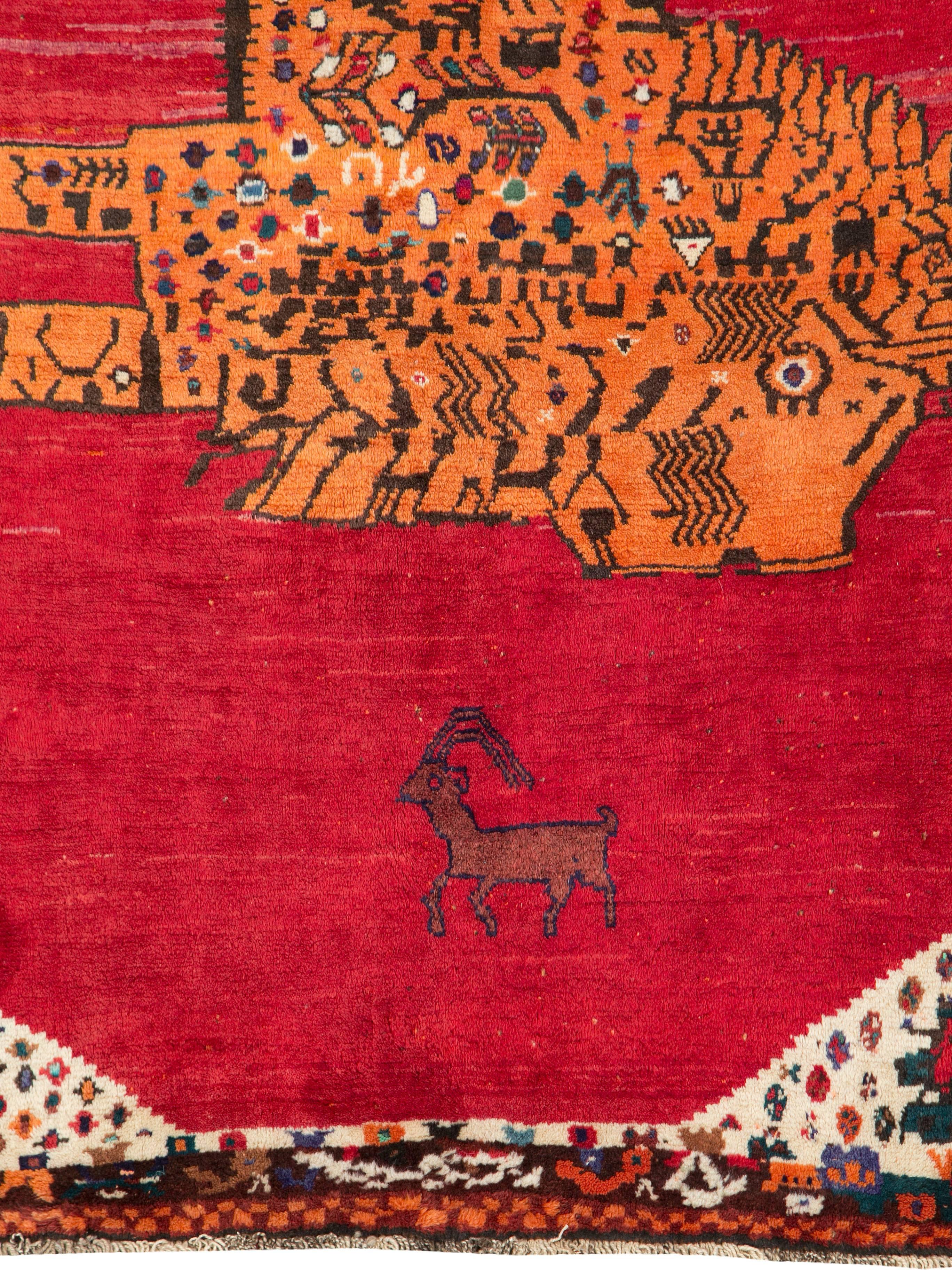 A vintage Persian Gabbeh carpet from the mid-20th century.