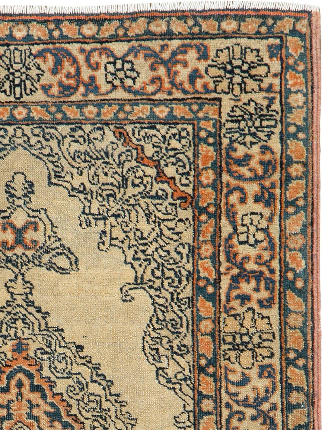 An antique Persian Tabriz carpet from the first quarter of the 20th century woven in the prominent workshop of Haji Jalili.
