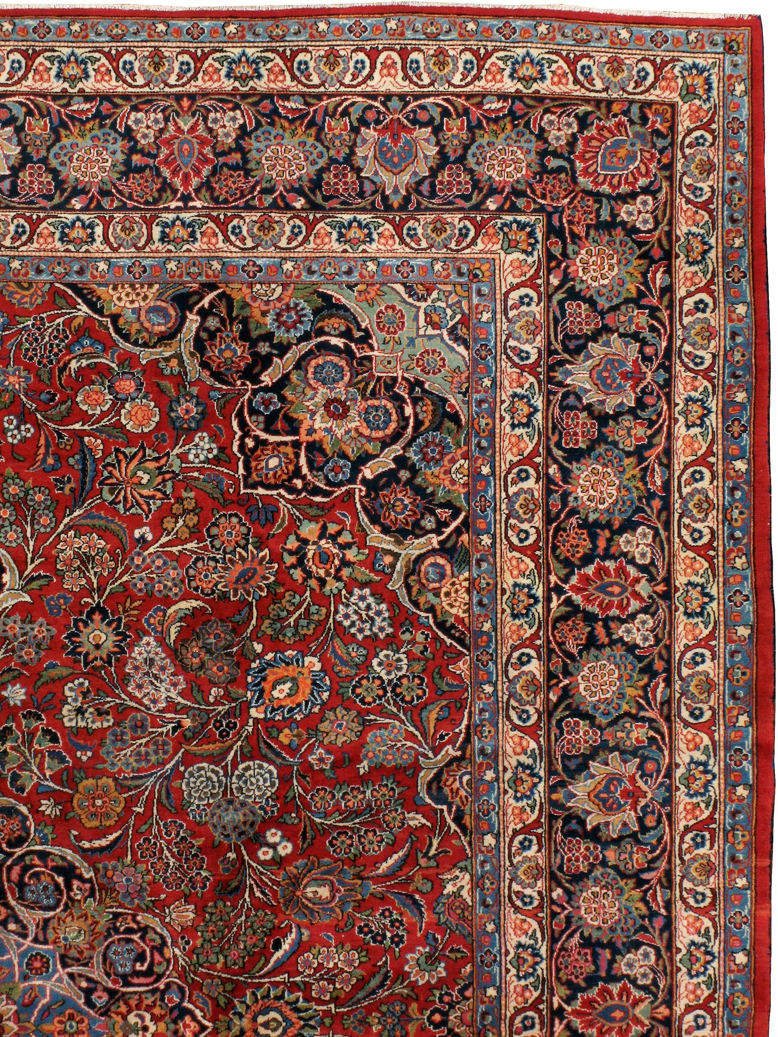 Mid-20th Century Handmade Persian Kashan 9' x 12' Room Size Rug in Red and Navy In Excellent Condition For Sale In New York, NY