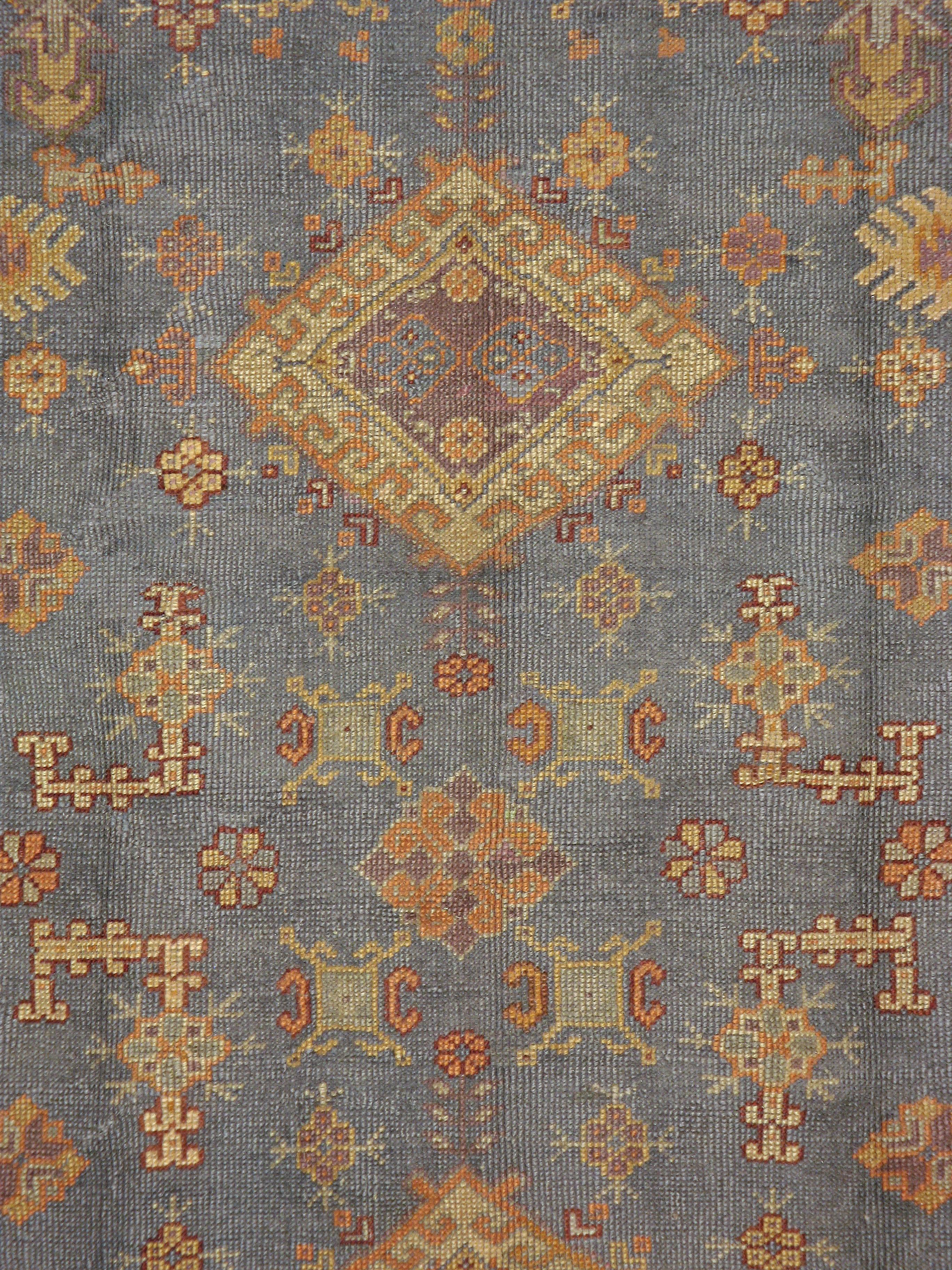 A vintage Turkish Oushak carpet from the second quarter of the 20th century.

Measures: 7' 3