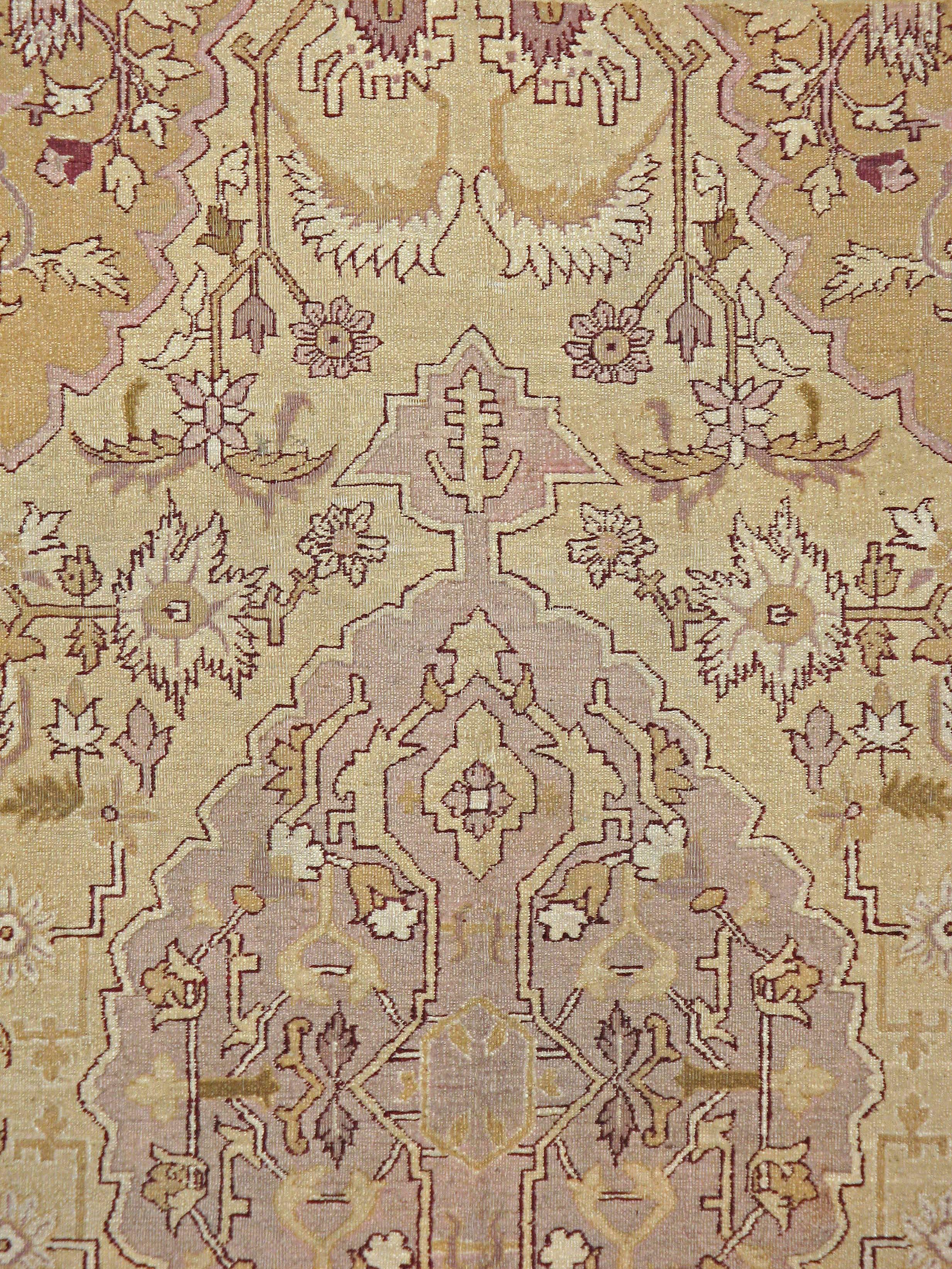 An antique Indian Agra carpet from the first quarter of the 20th century.