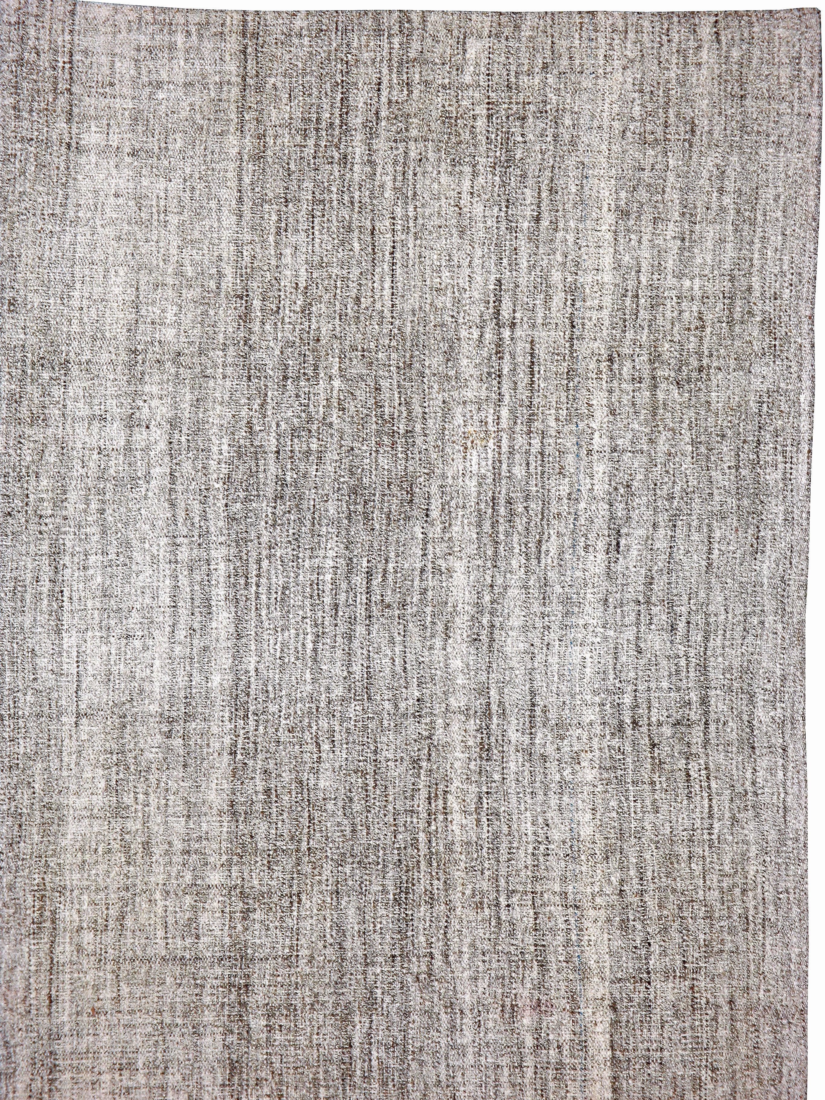A vintage Turkish flat-woven Kilim carpet from the mid-20th century. All natural undyed wool, featuring a beautiful salt and pepper pattern.