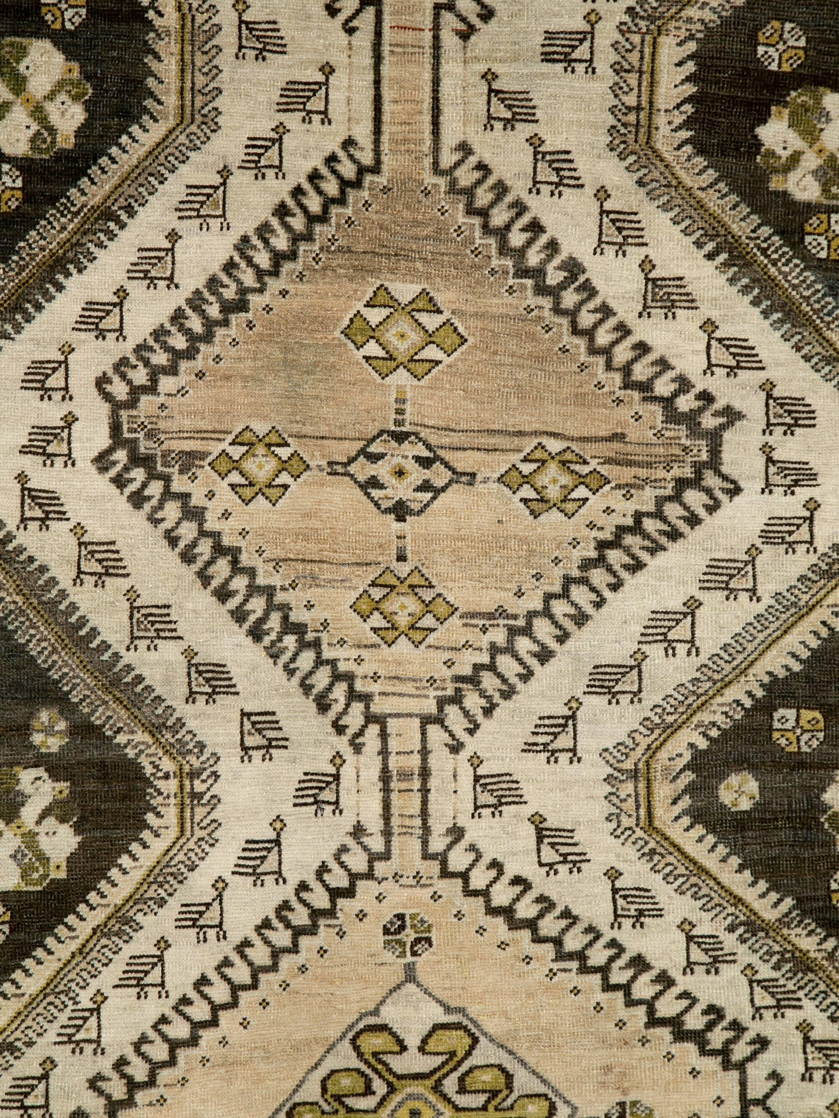A Persian Malayer rug from the first quart of the 20th century.