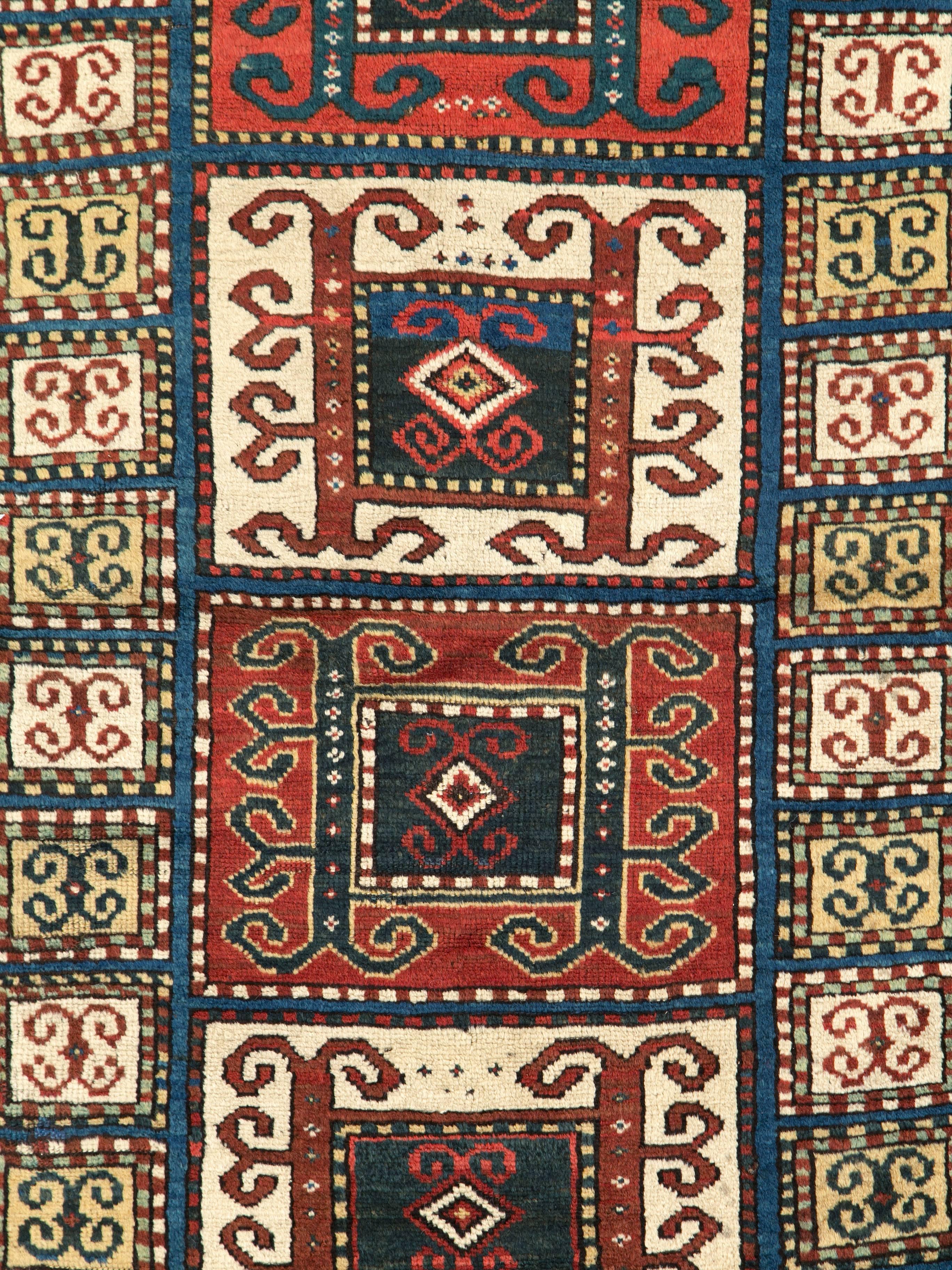 An early 20th century Kazak rug.