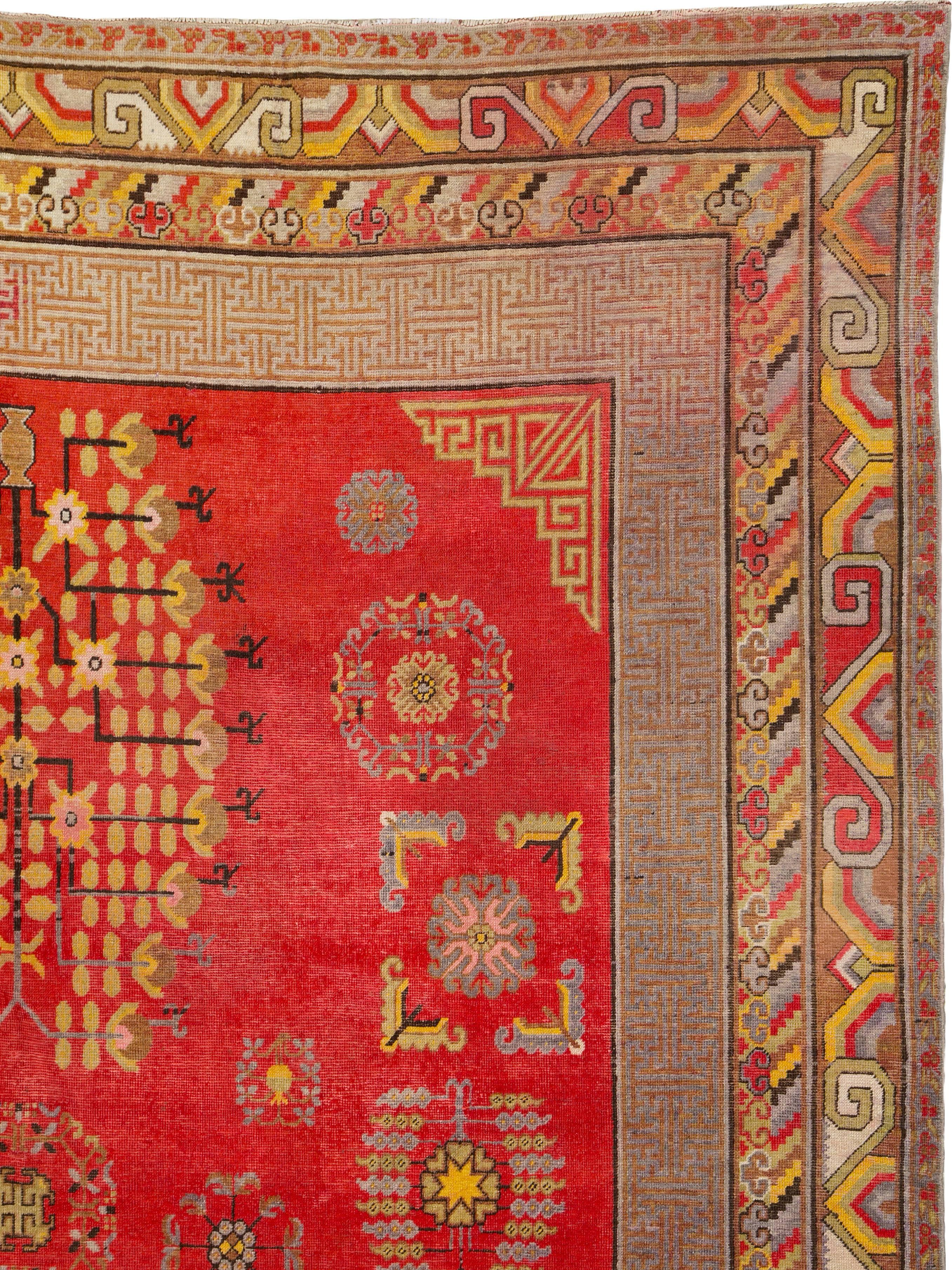 Hand-Knotted Antique Khotan Carpet For Sale
