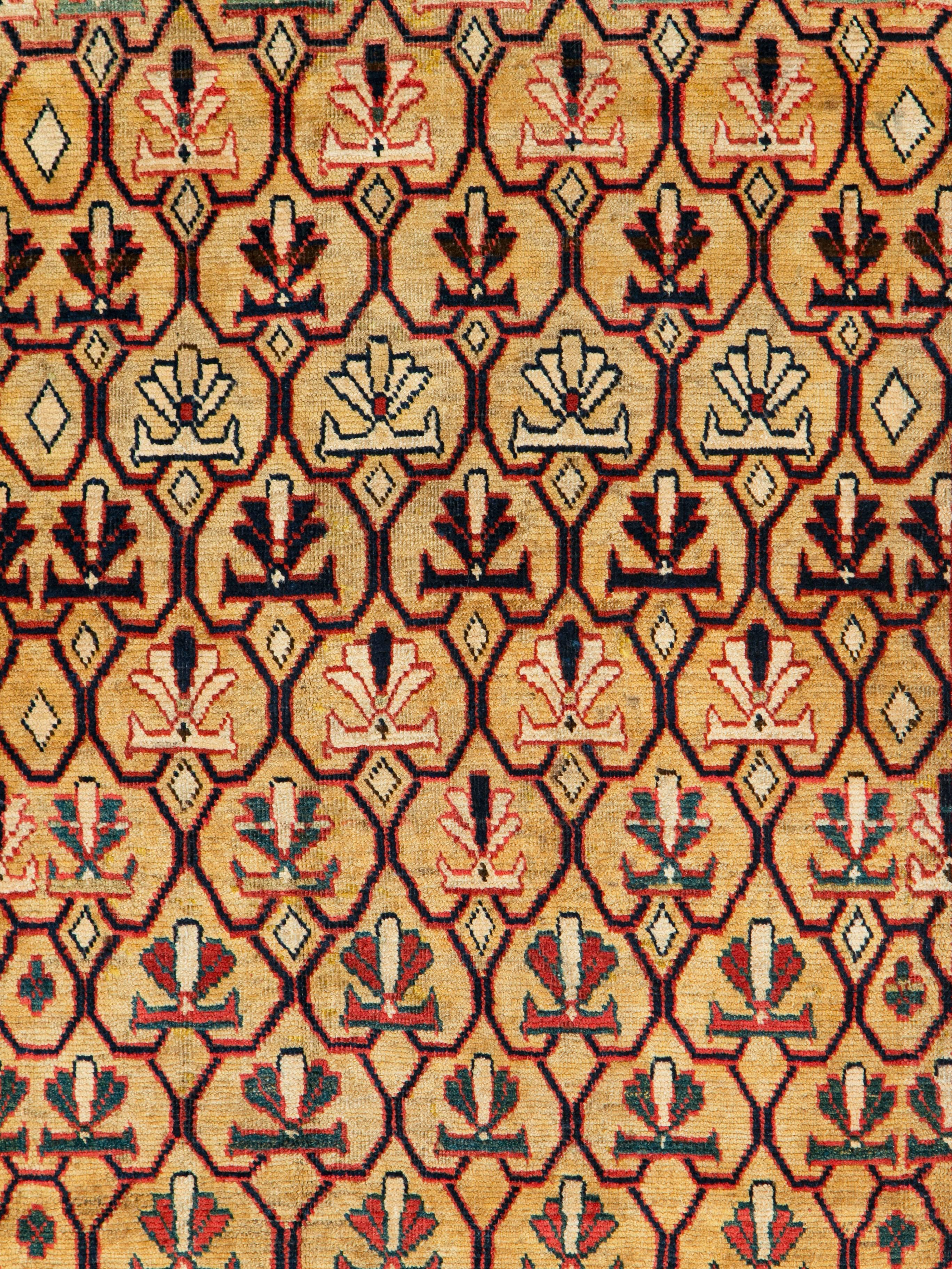 A vintage Persian hamadan rug from the mid-20th century.