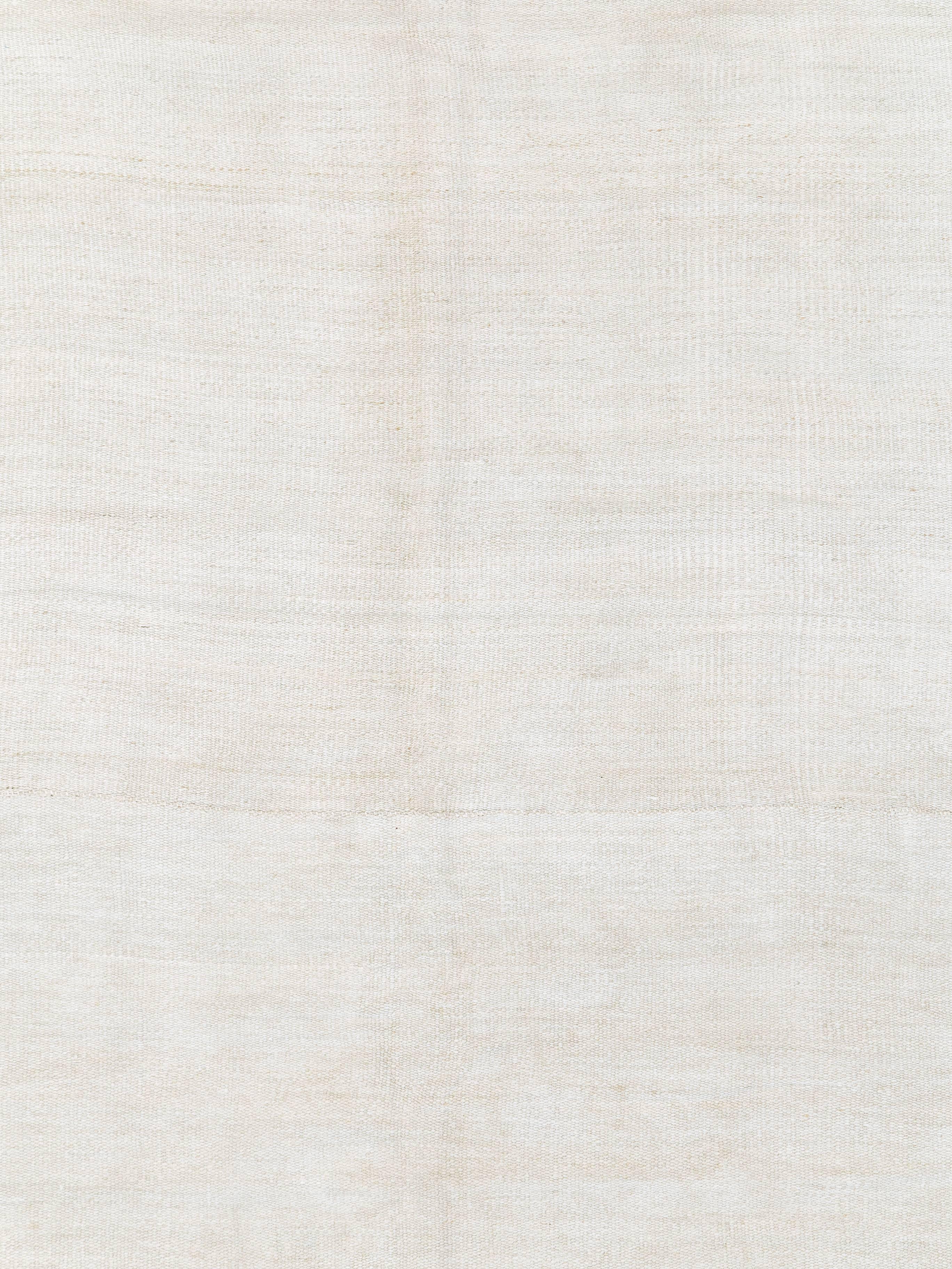 A white vintage Turkish flat-woven carpet from the mid-20th century.