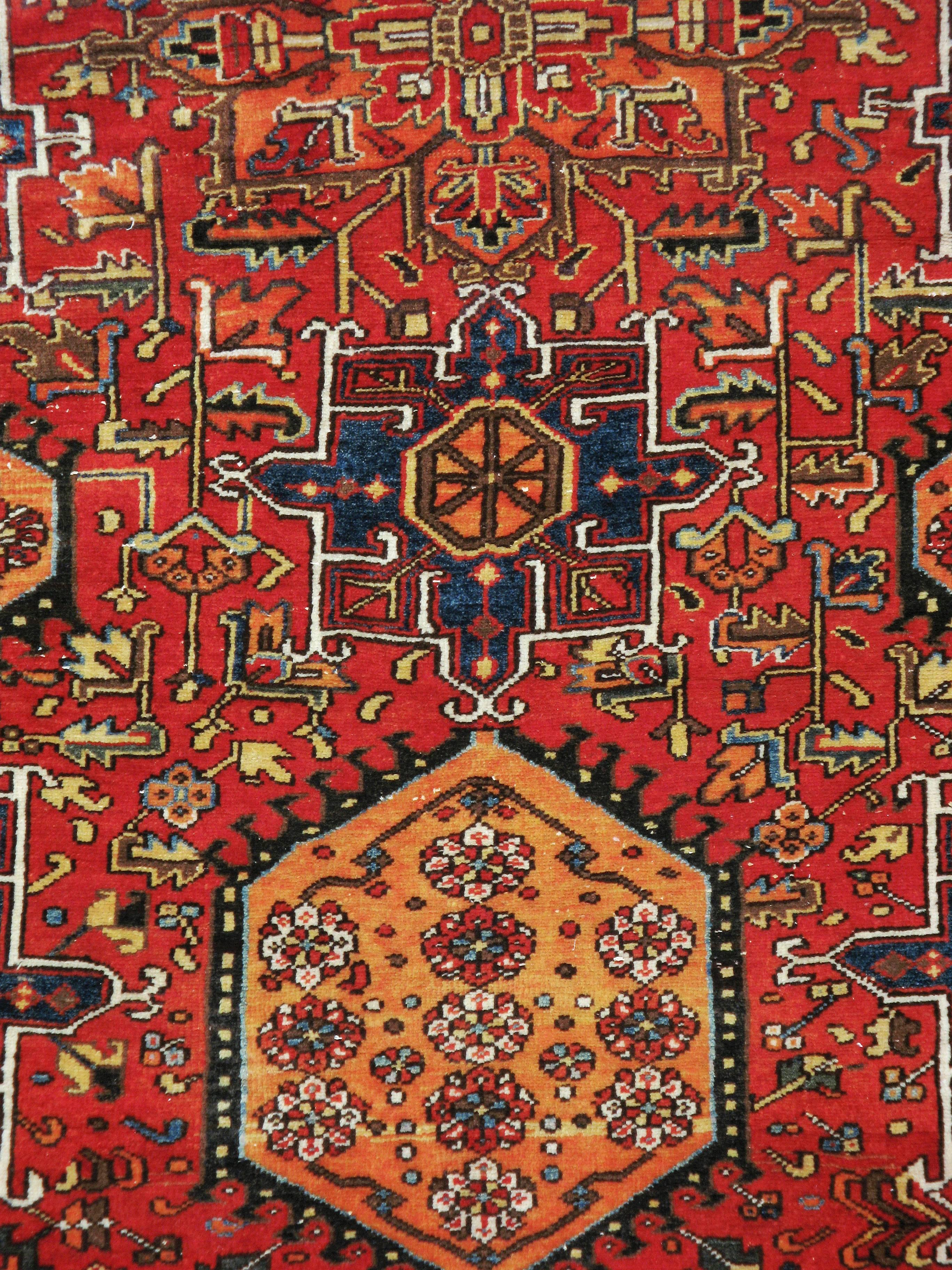 A vintage Persian Karajeh rug from the mid-20th century.

Measures: 8' 5