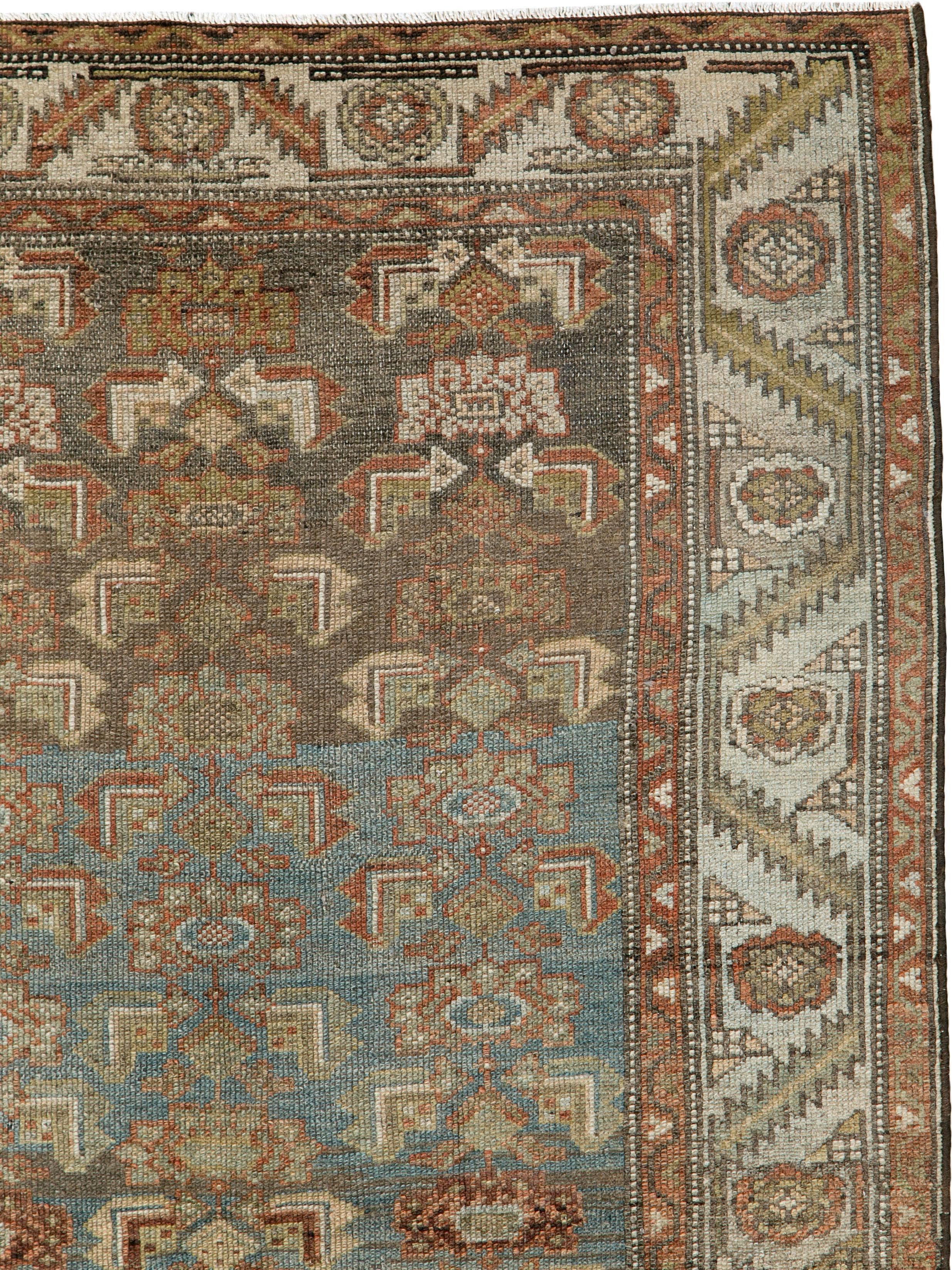 An antique Persian Kurd rug from the first quarter of the 20th century.