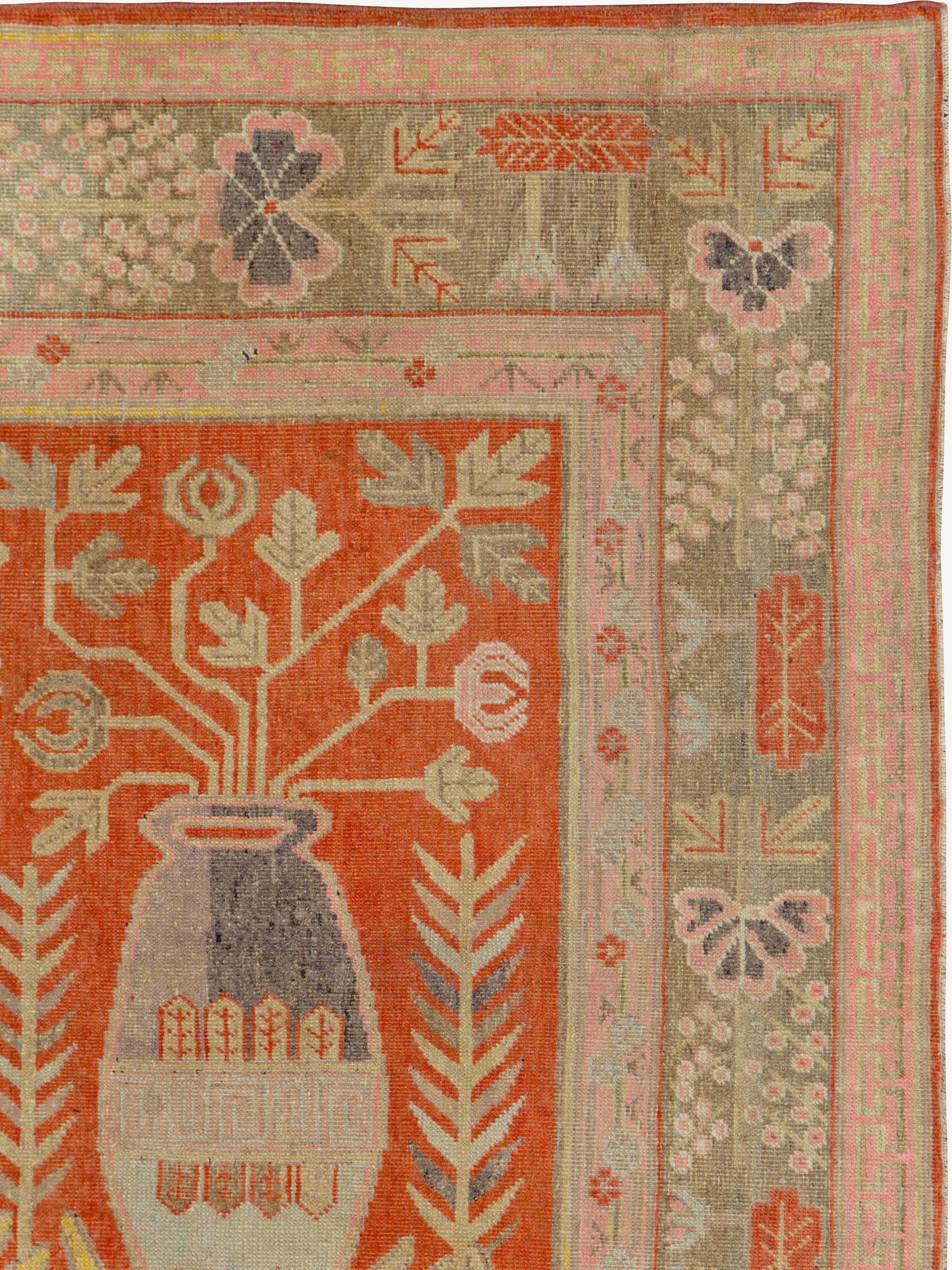 An antique East Turkestan Khotan rug from the early 20th century.