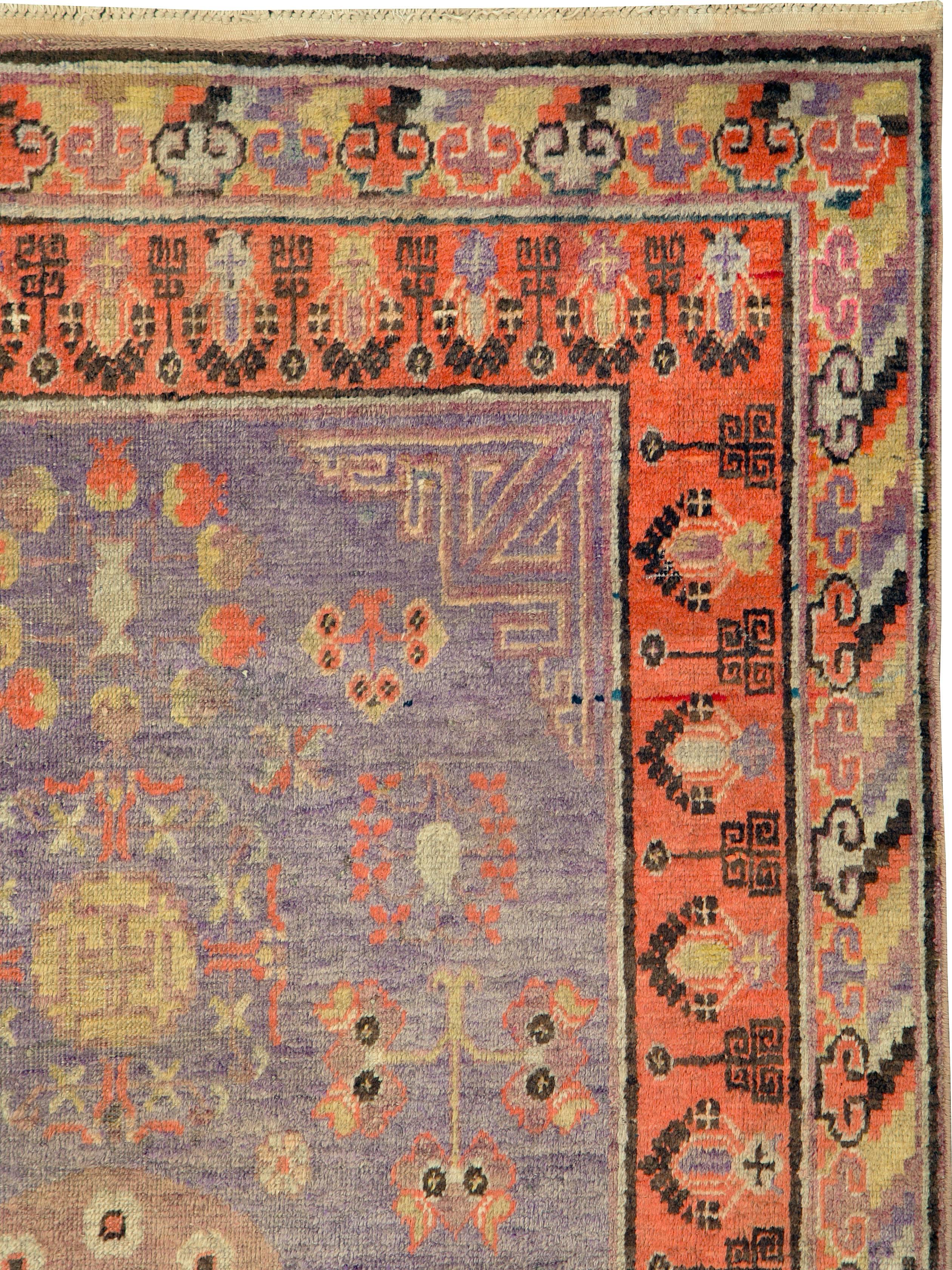 An antique East Turkestan Khotan from the early 20th century.