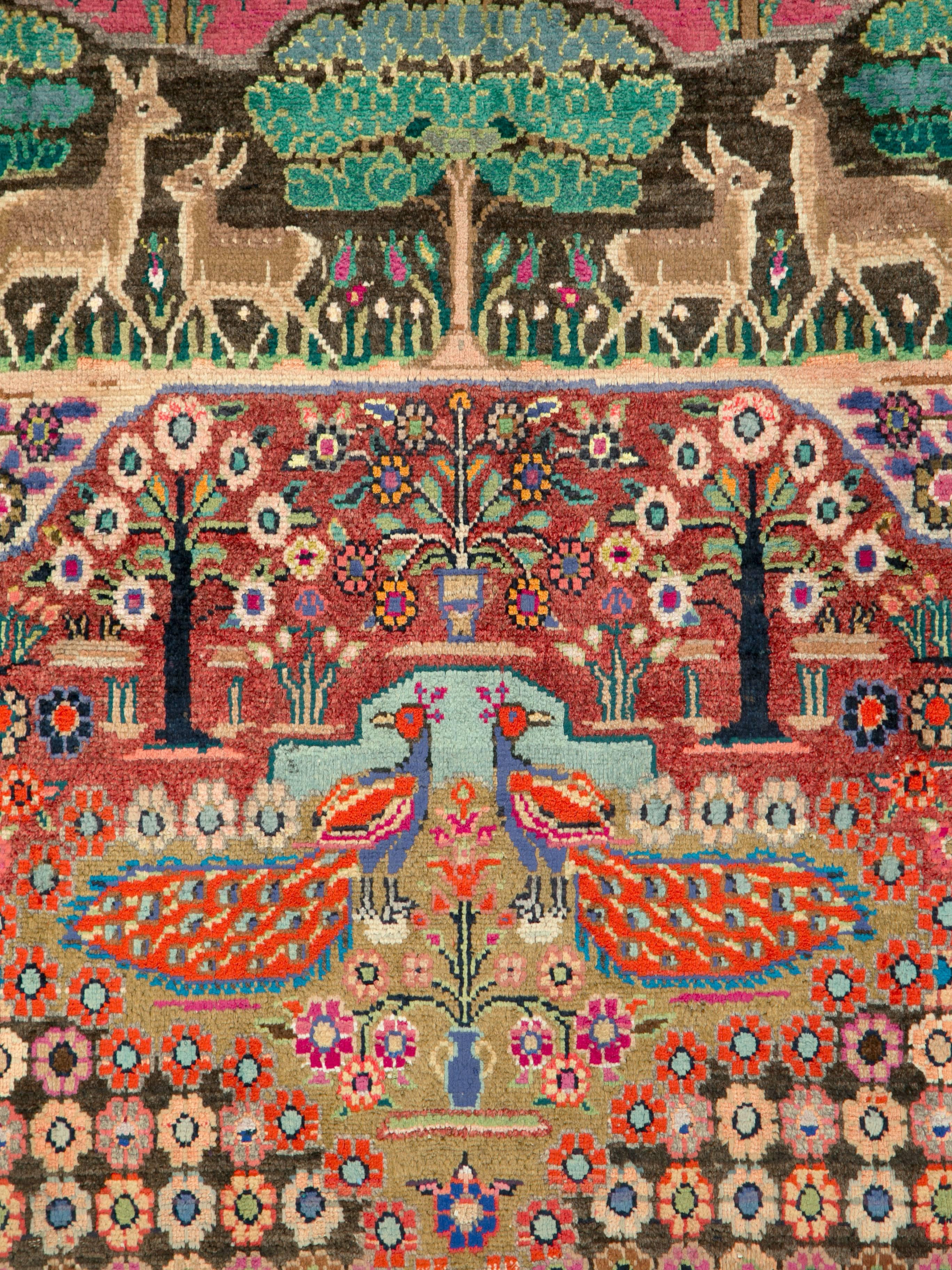 A vintage Persian Hamadan pictorial rug from the mid-20th century.