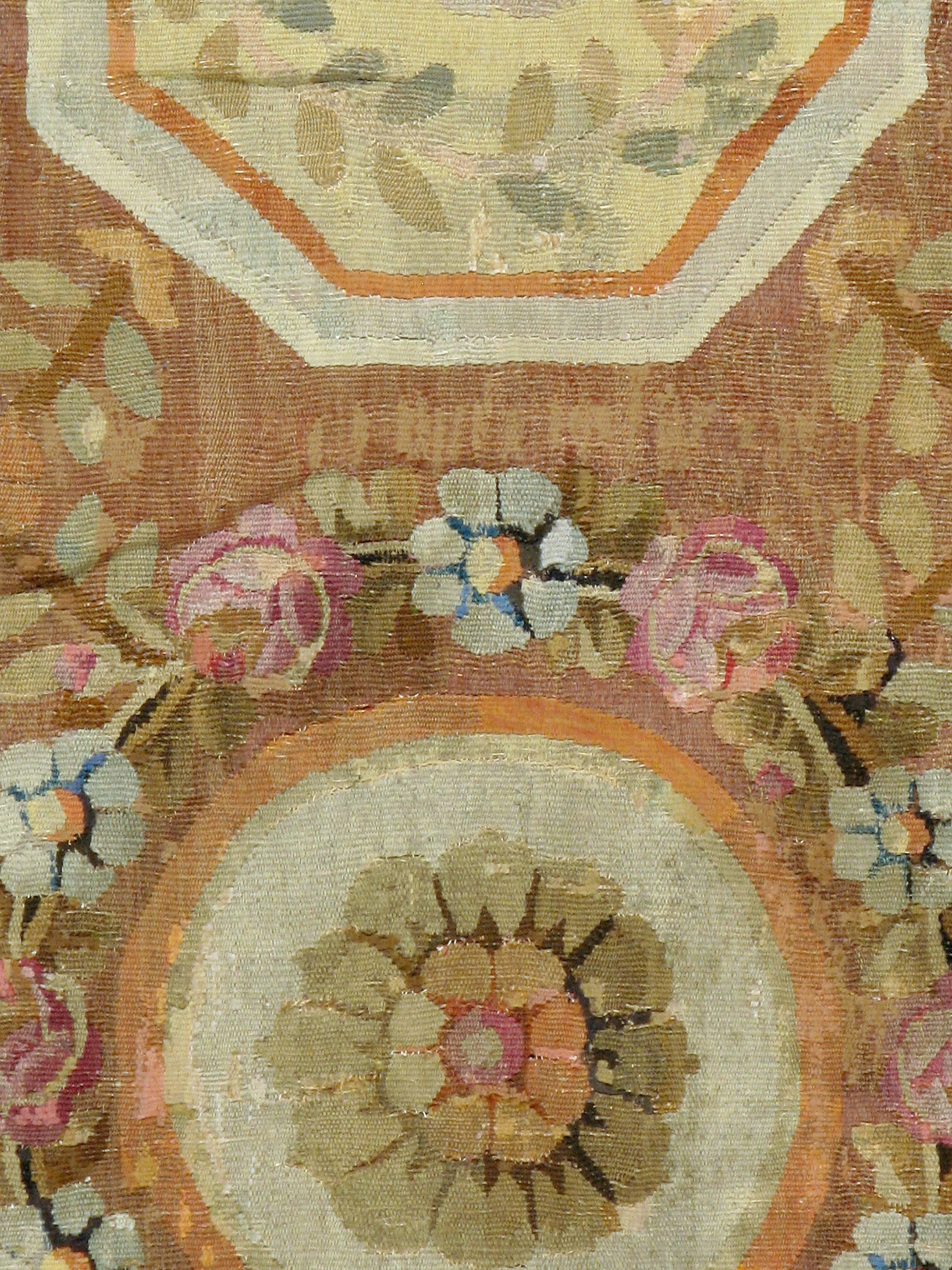 An antique French Aubusson carpet from the late 19th century.

The style of Aubusson tapestries and carpets produced have changed over the centuries because of its war-ridden history. There is no official date on how far back Aubusson’s are