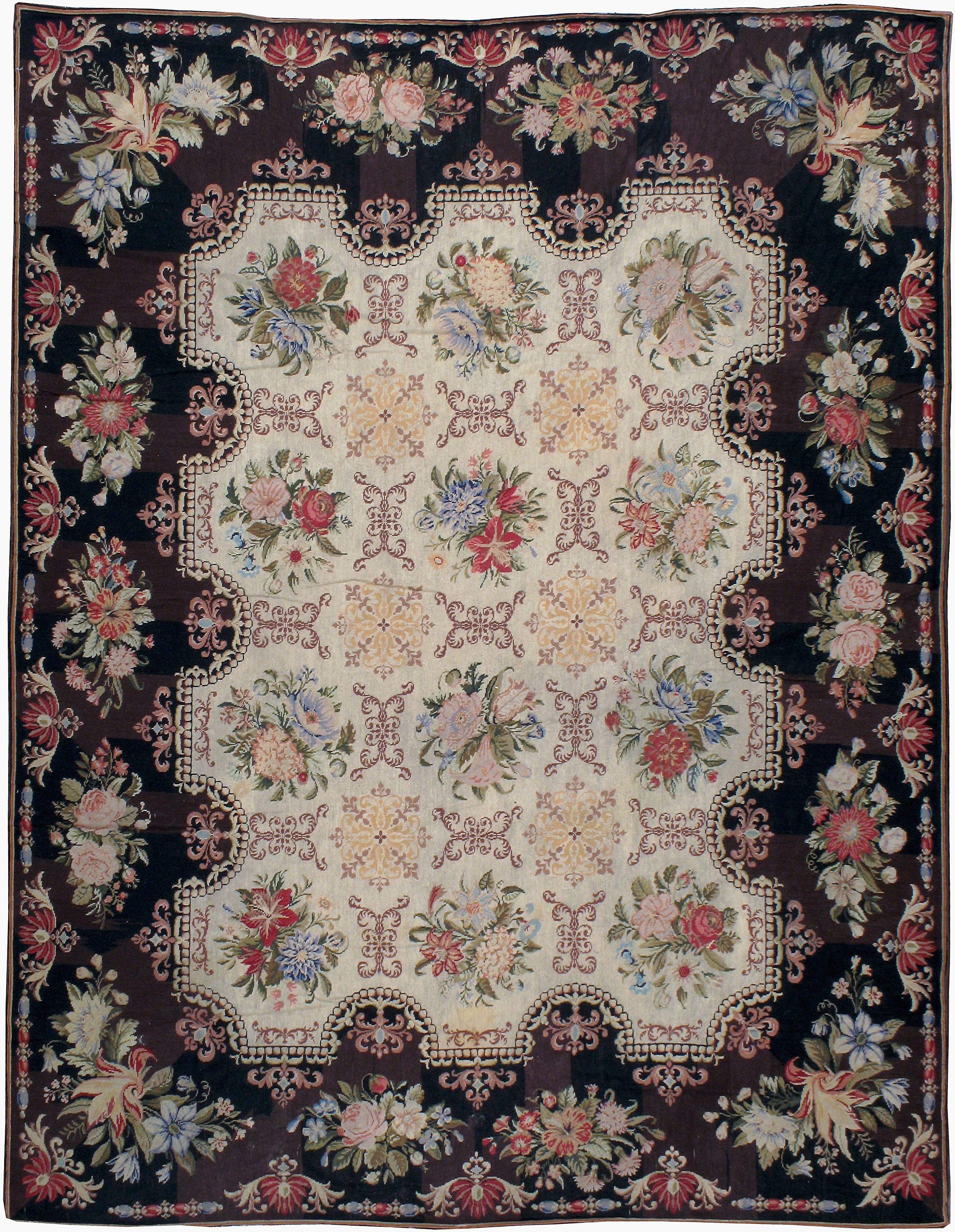A true representation of elegance and sophistication, this flat-woven needlework dates back over 100 years, yet well preserved in its original quality. Acanthus-leaf motifs, Baroque scrolls and European floral bouquets form an eclectic medieval,