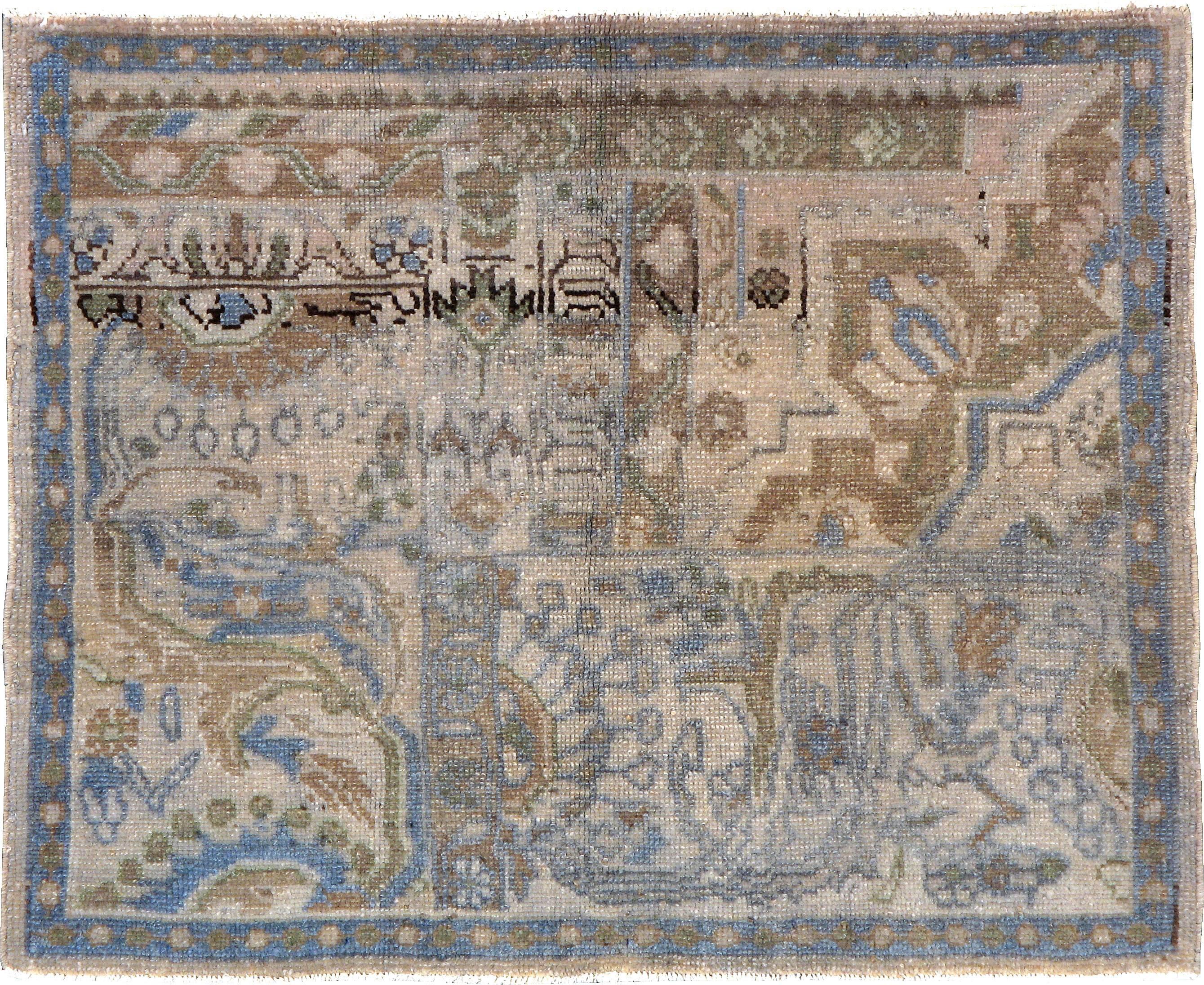 An early, second quarter 20th century Persian sampler carpet. Wagireh samples display sections of numerous patterns artistically combined with a distinctive border and color palette so consumers and weavers have a scaled down model for the