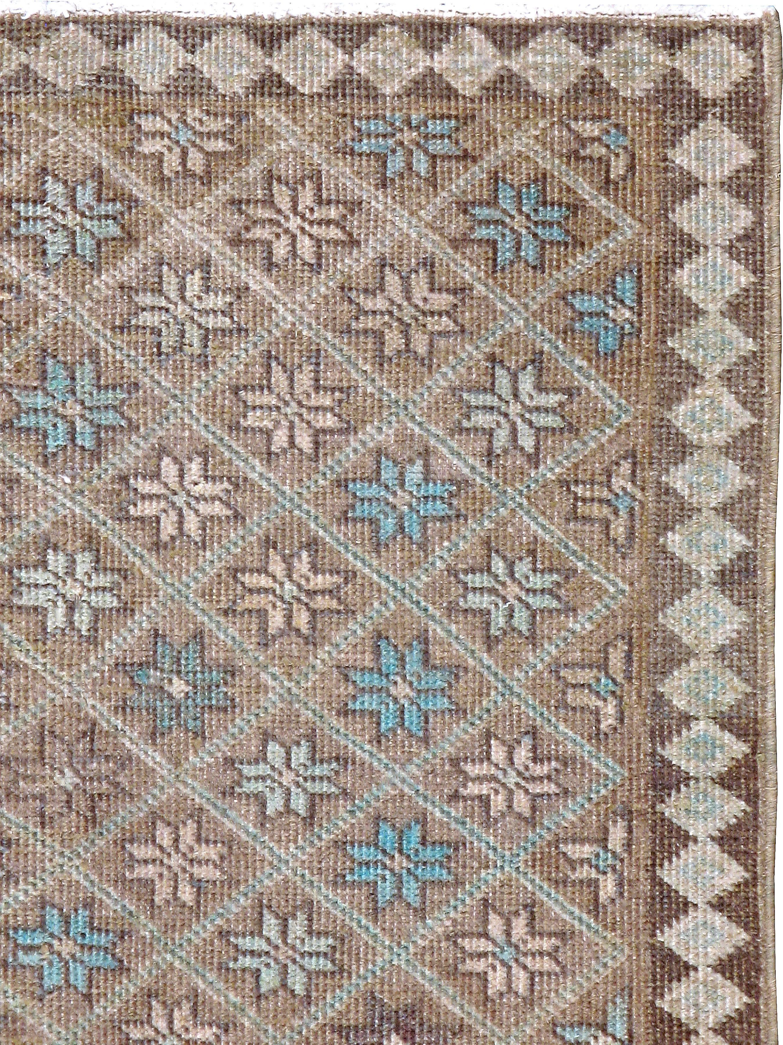 A mid-20th century Persian Tabriz carpet in the style of Turkish Damali rugs. Damali rugs are typically in a checkered or diamond-checkered pattern, hence the name 