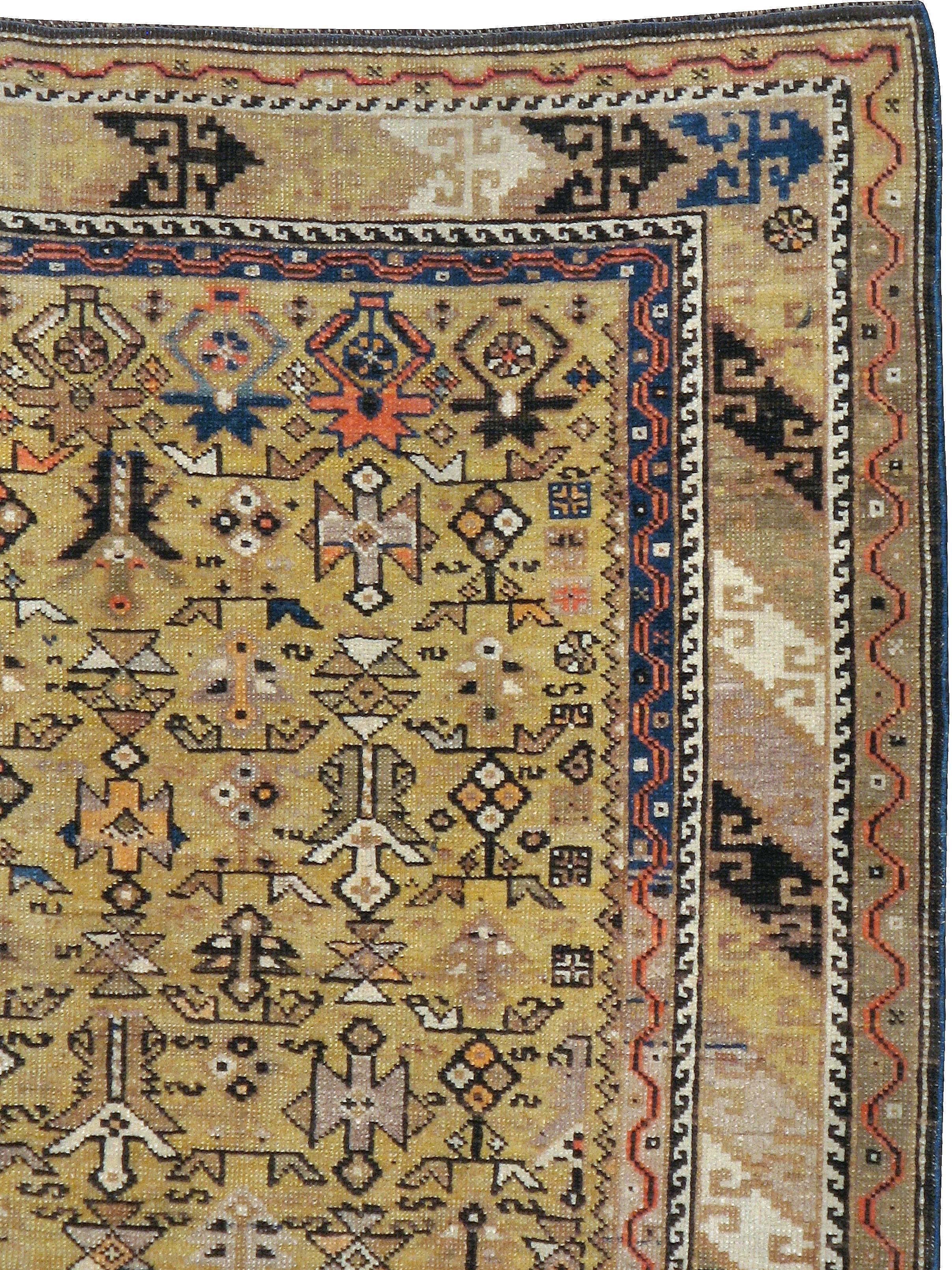 An antique Caucasian Kuba carpet from the turn of the 20th century.