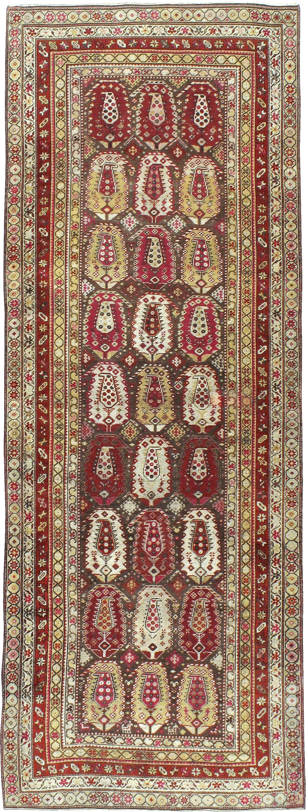 An antique Persian North West rug from the first quarter of the 20th century.