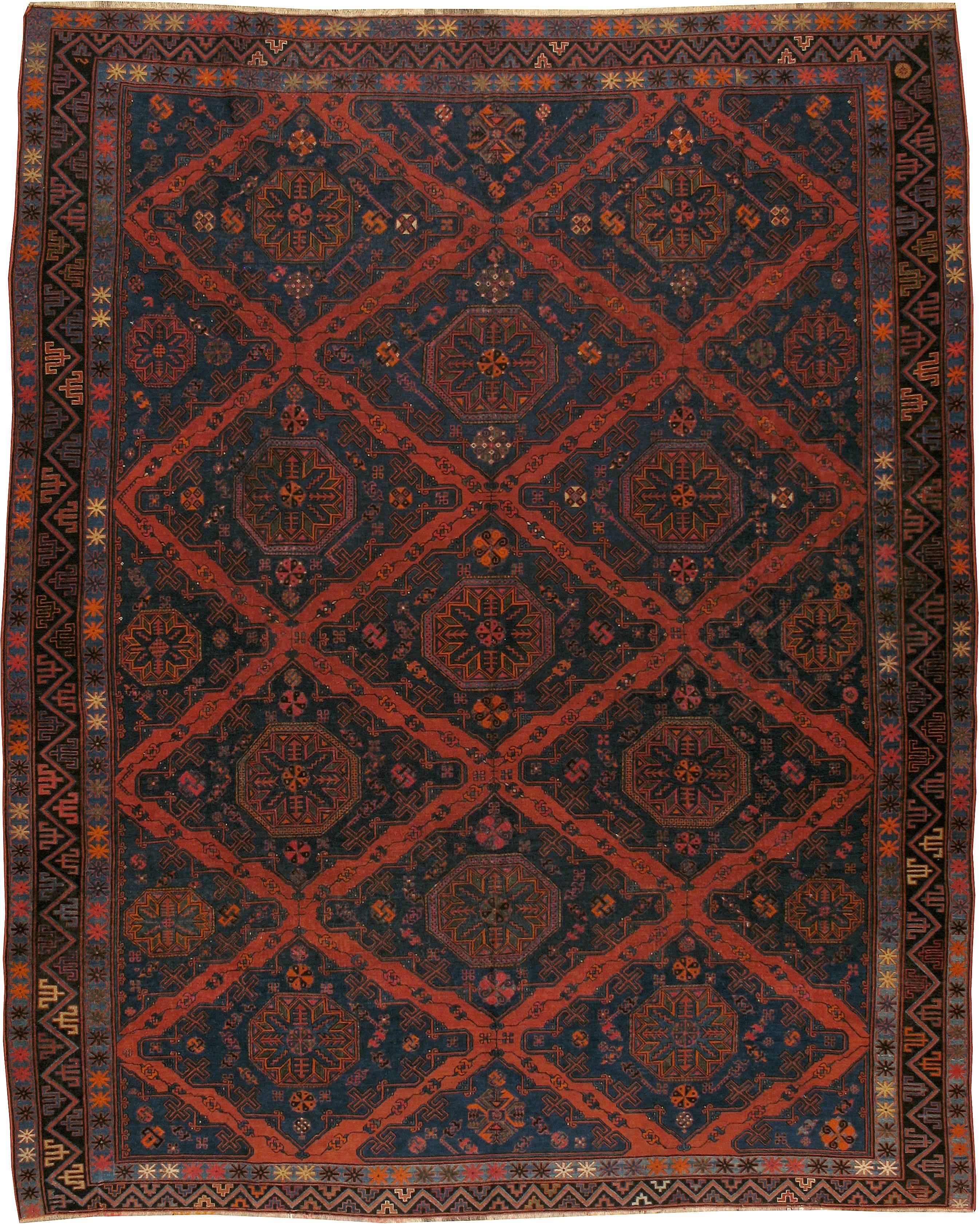 A vintage Russian Sumak (also spelled Soumak or sumac) carpet from the second quarter of the 20th century with Holbein octagon motifs within a lozenge design.