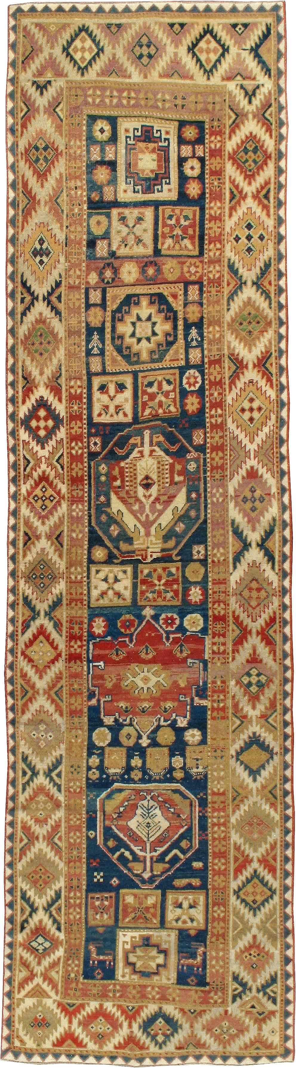 An antique North West Persian rug from the turn of the 20th century.