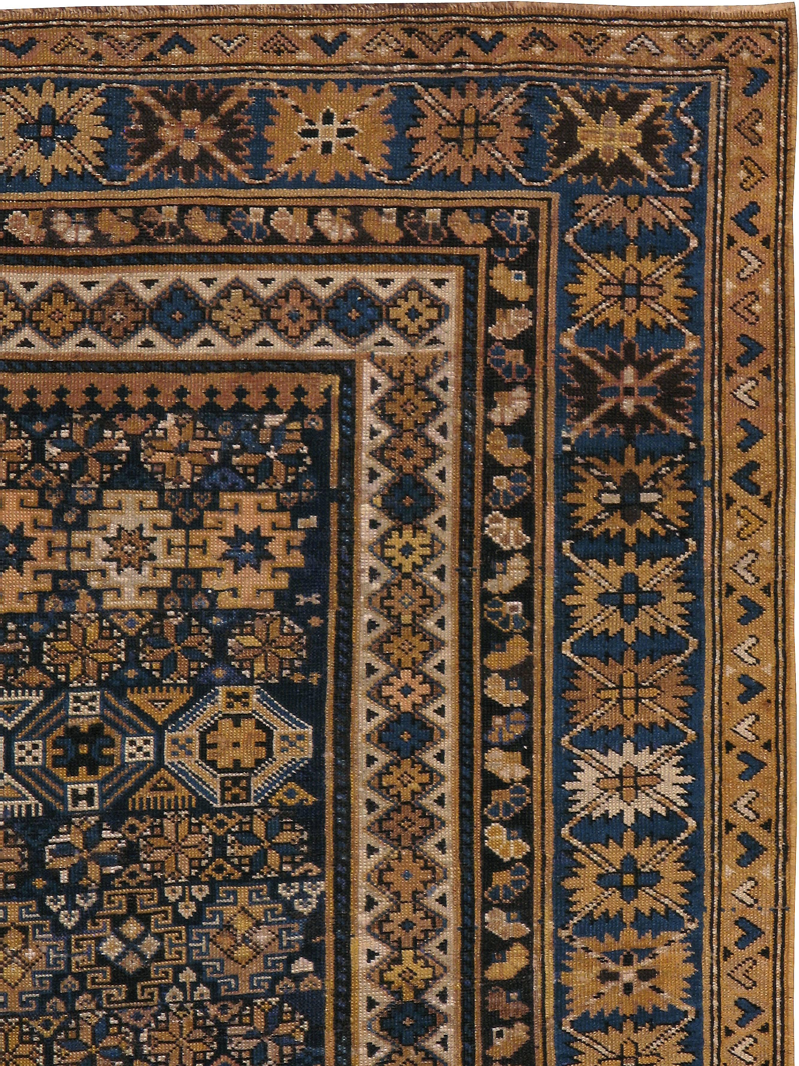 An antique Caucasian carpet from the turn of the 20th century.