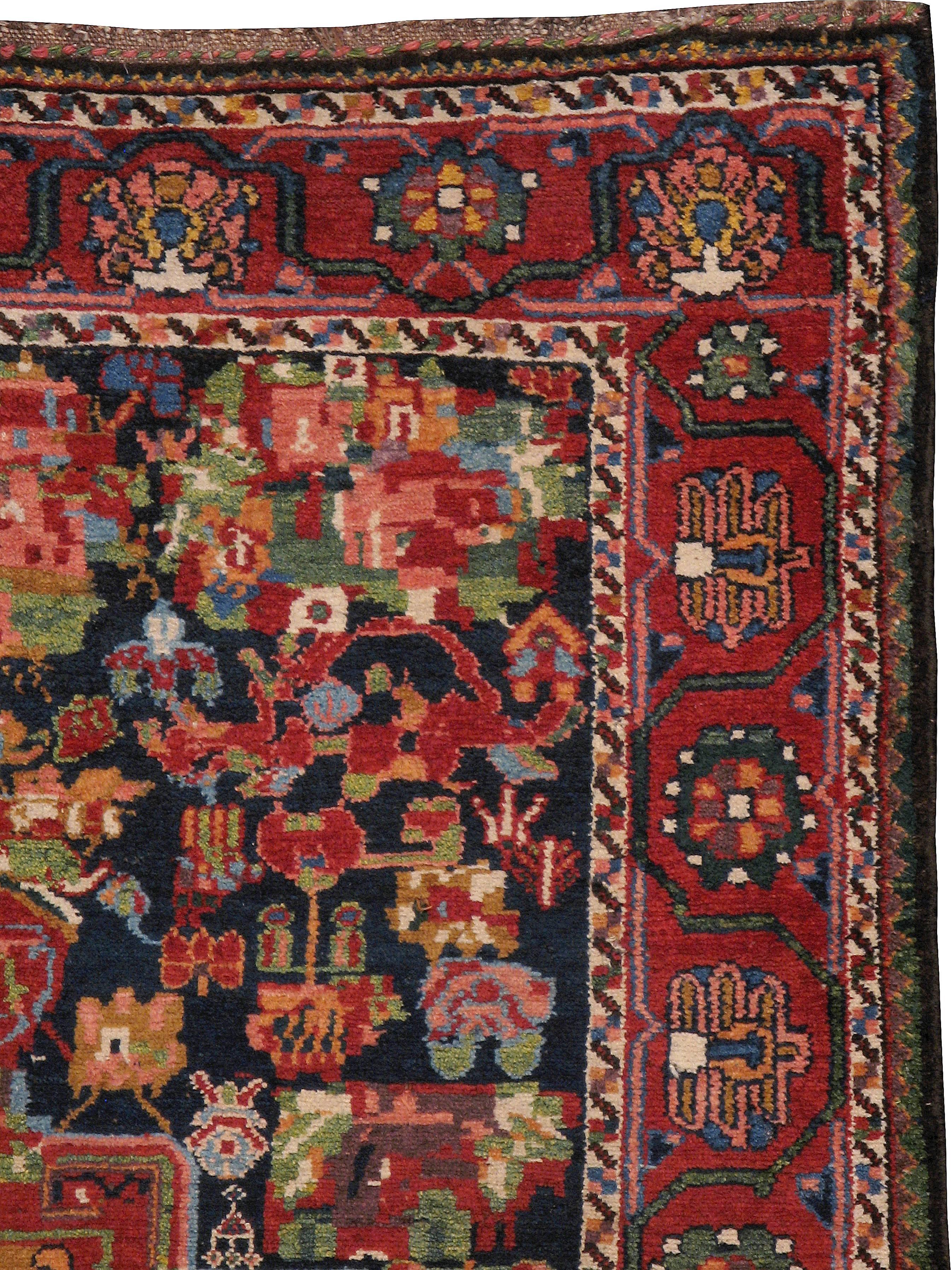 An antique Persian Bakhtiari carpet from the turn of the 20th century.