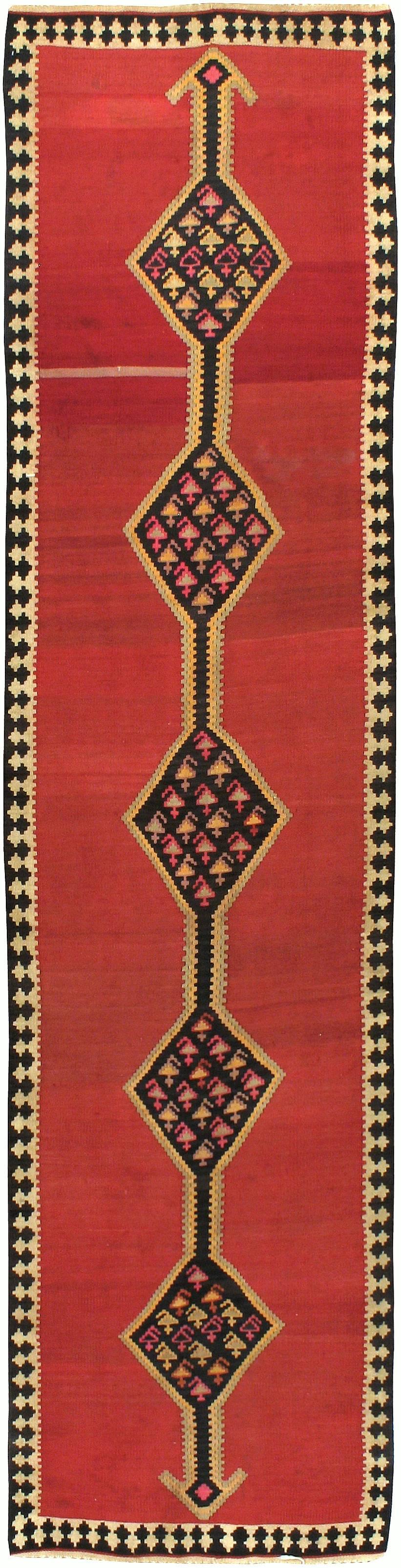 A vintage Turkish Kilim flat-weave from the second quarter of the 20th century.