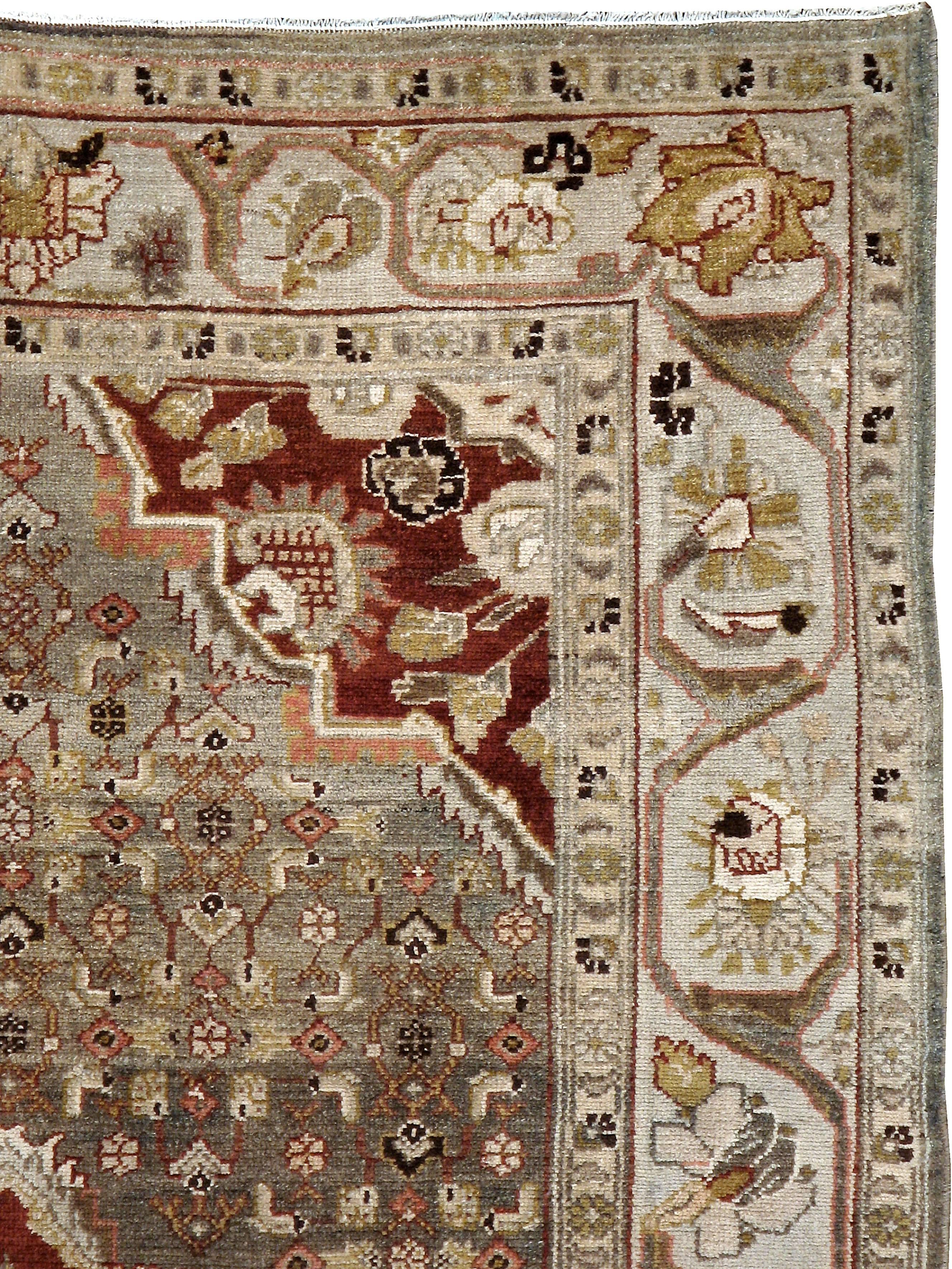 An antique Persian Malayer carpet from the second quarter of the 20th century.