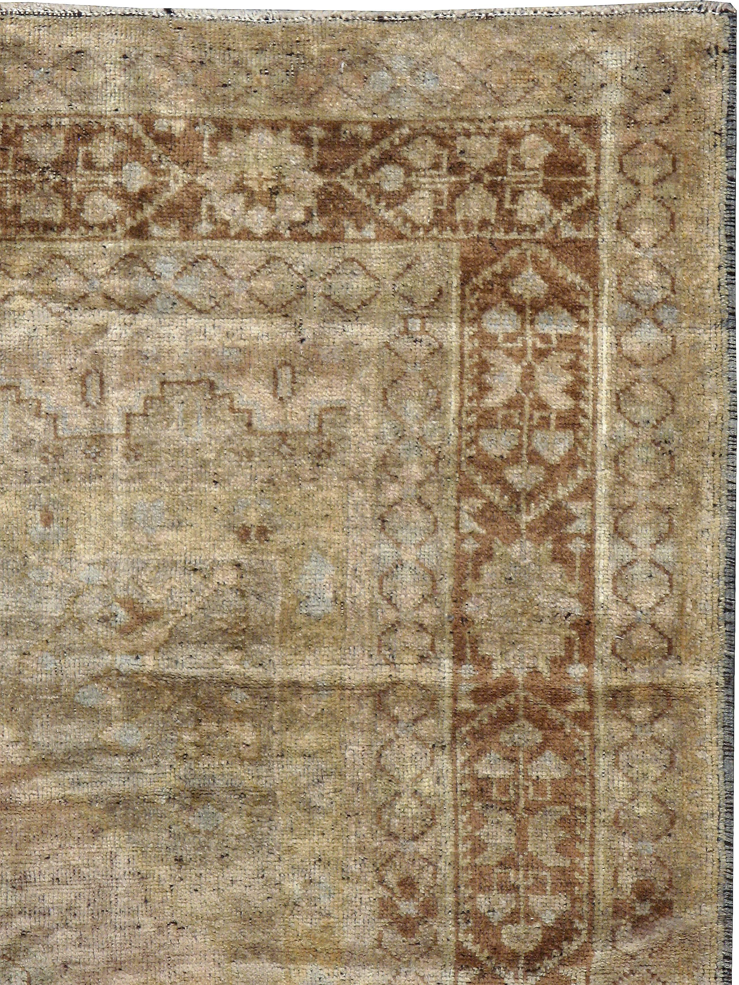 An antique Turkish Oushak carpet from the second quarter of the 20th century.