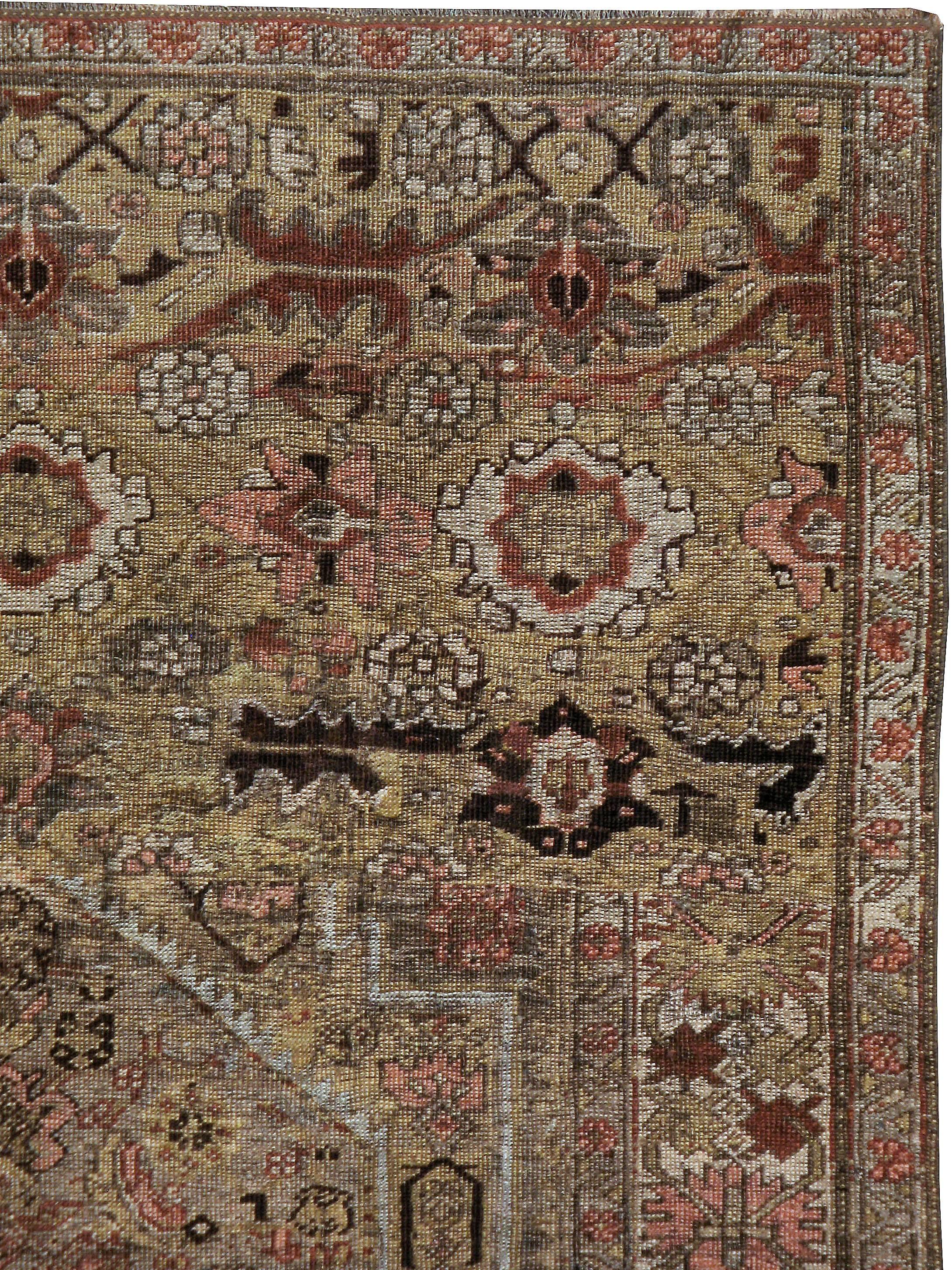 An antique Persian Bidjar carpet from the turn of the 20th century.