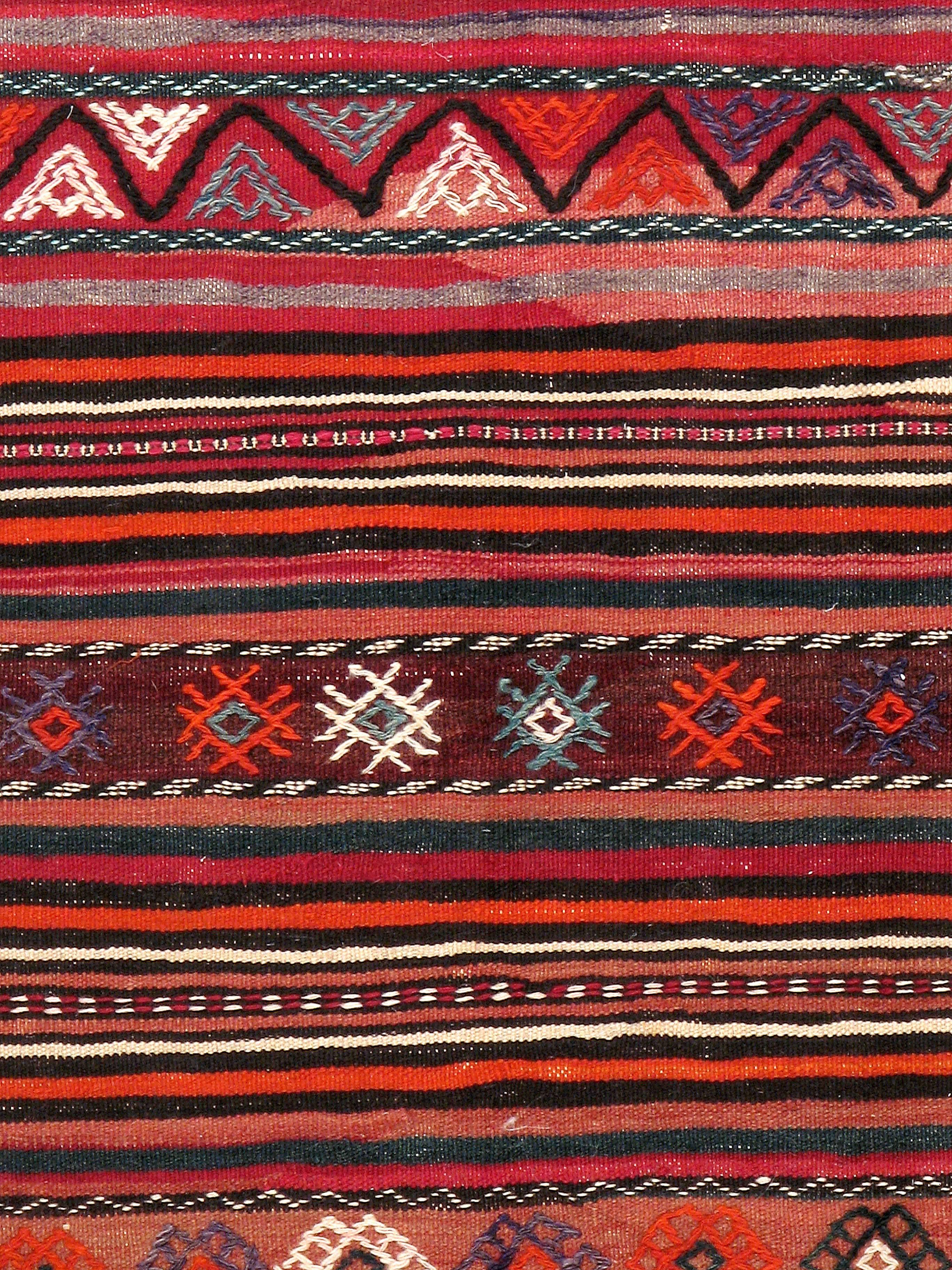 A vintage Turkish flat-woven Kilim carpet from the third quarter of the 20th century.