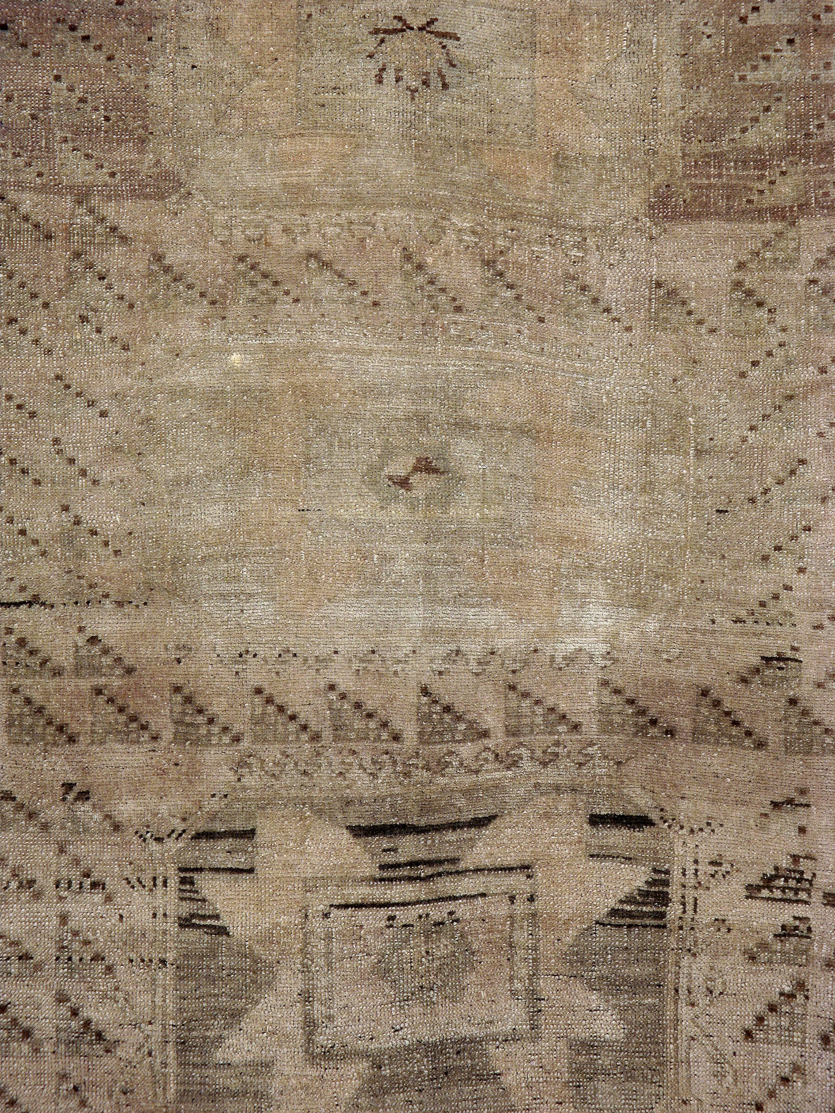 An antique Turkish Oushak Rug from the second quarter of the 20th century.