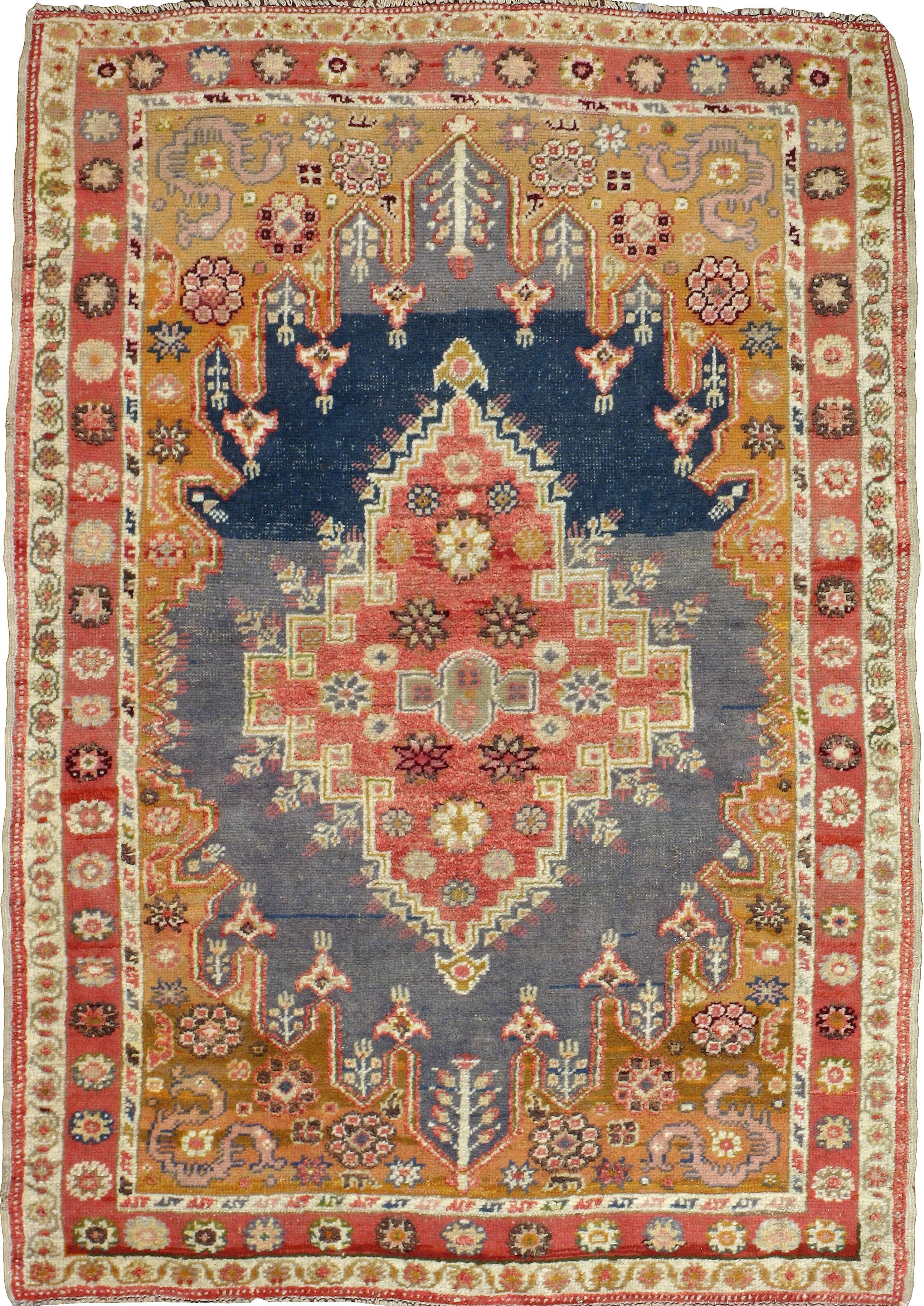 An antique Turkish Oushak carpet from the first quarter of the 20th century.