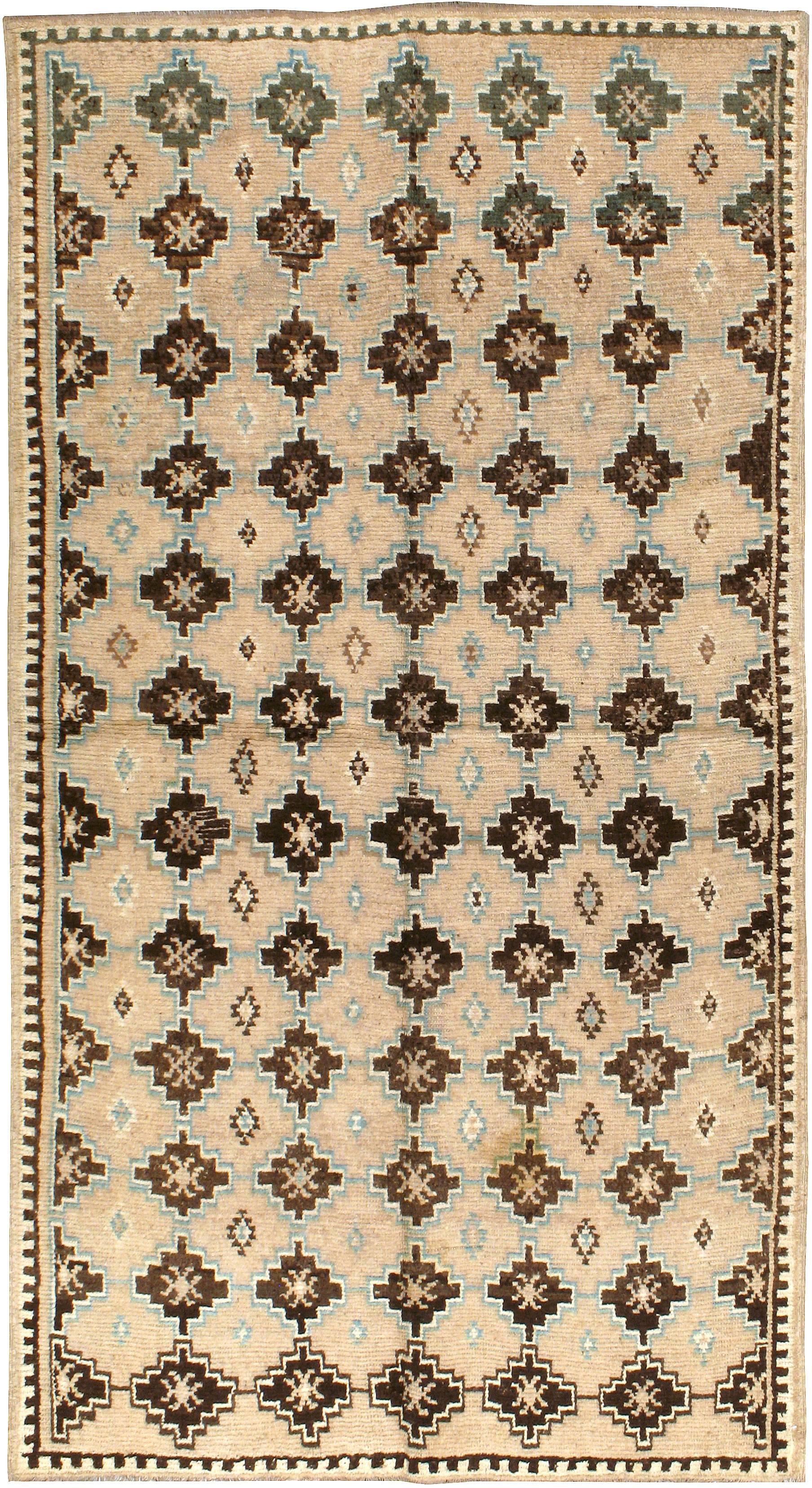 A vintage Moroccan carpet from the mid-20th century.