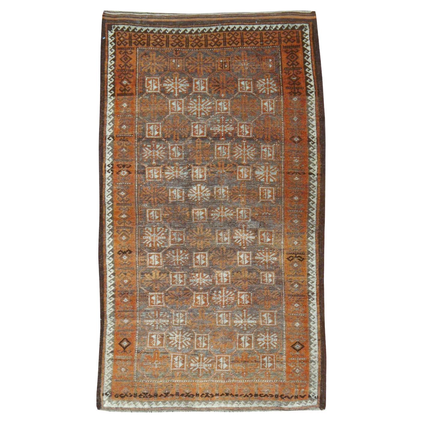 Tapis persan Baluch du milieu du 20e siècle