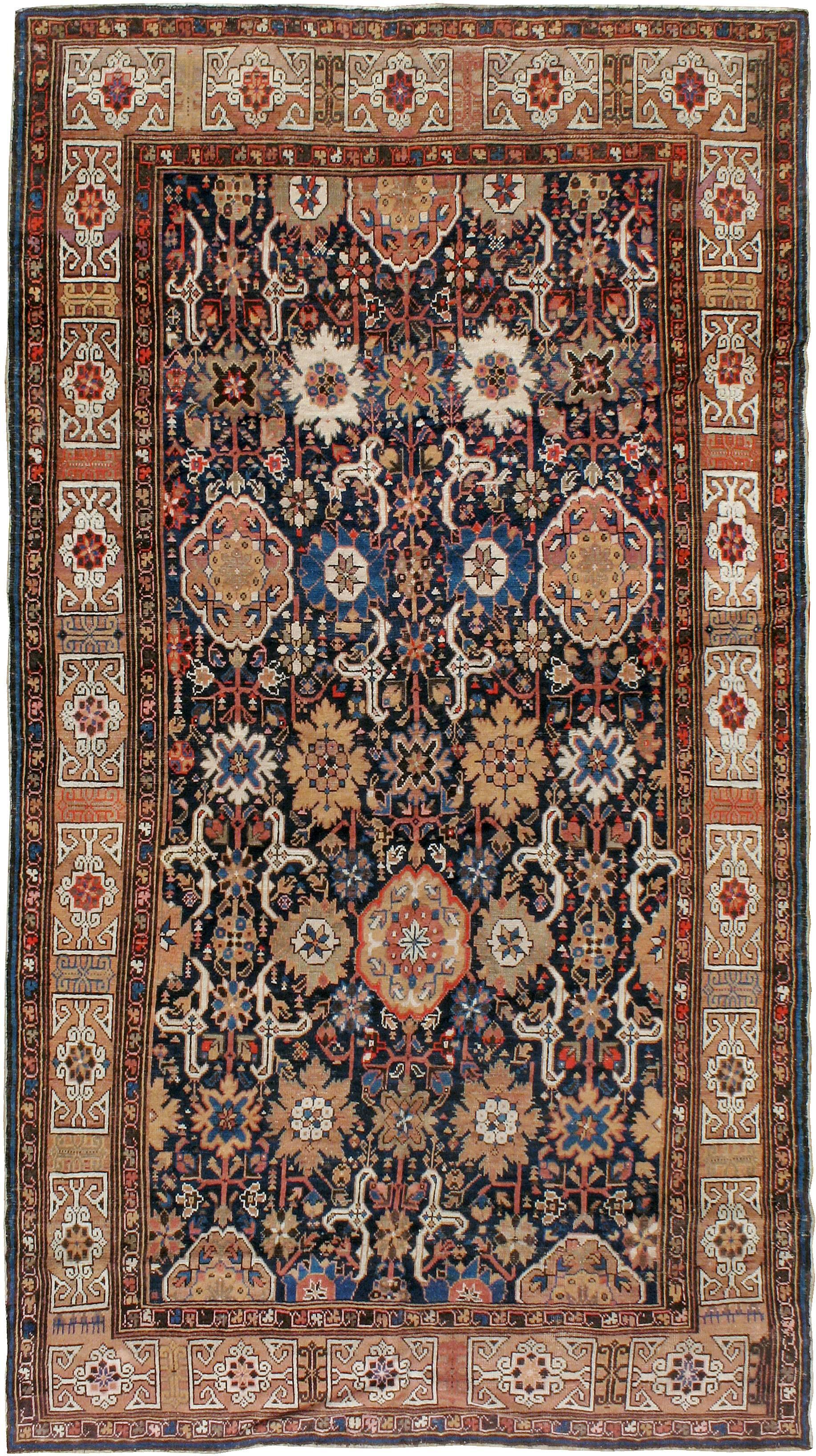 An antique Persian North West gallery carpet from the first quarter of the 20th century with a Kuba design.  This Caucasian weaving style featuring the avshan design and Kufic border derived from the early 18th century.
