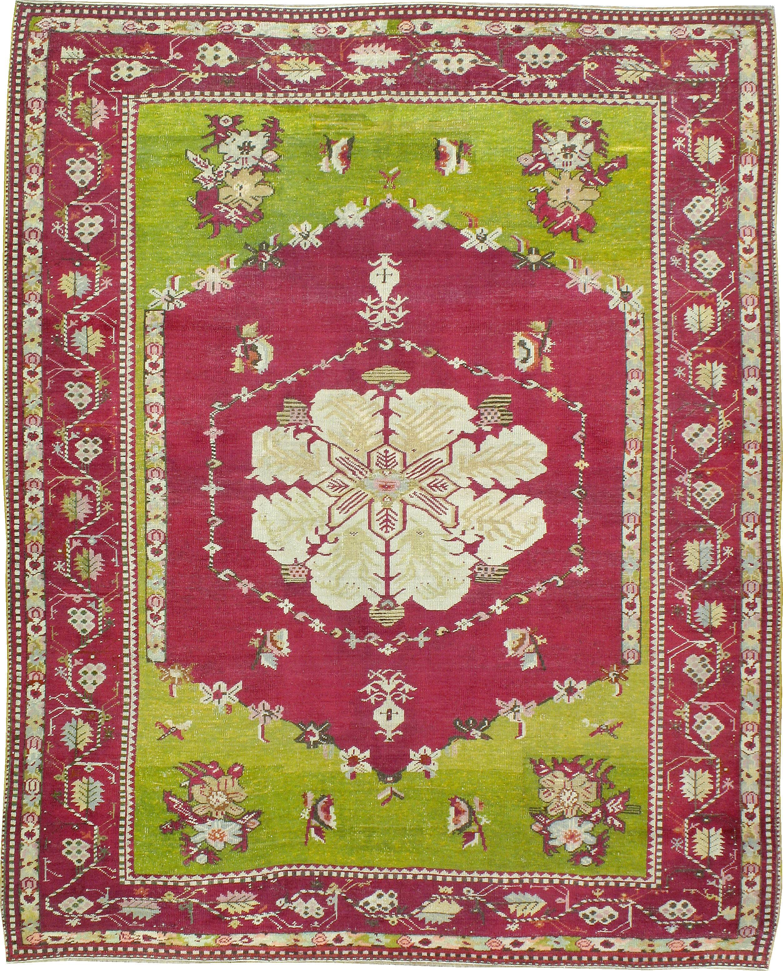 An antique Turkish Ghourdes (also spelled Ghiordes) carpet from the turn of the 20th century.