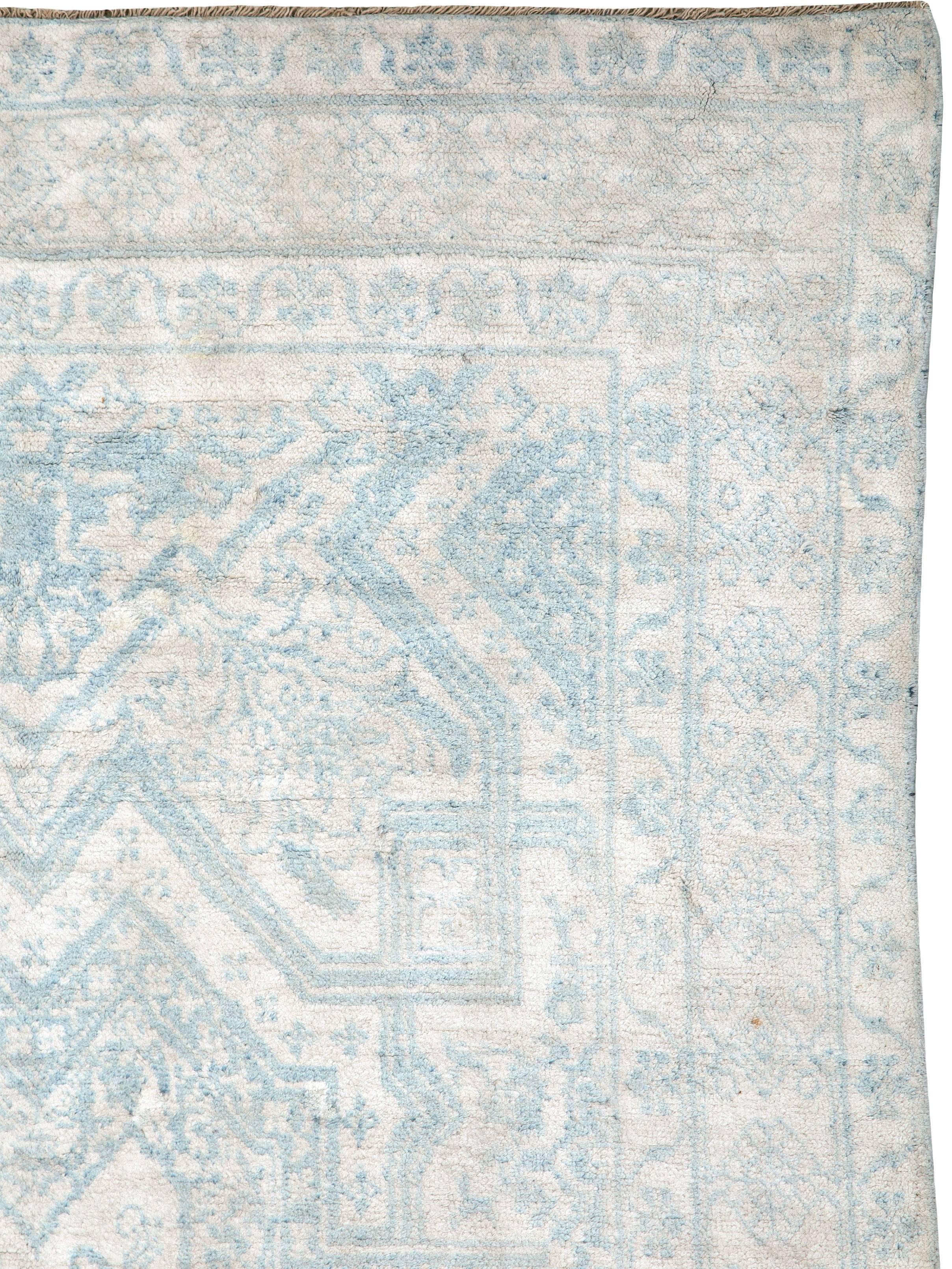A vintage Indian cotton Agra carpet from the second quarter of the 20th century.