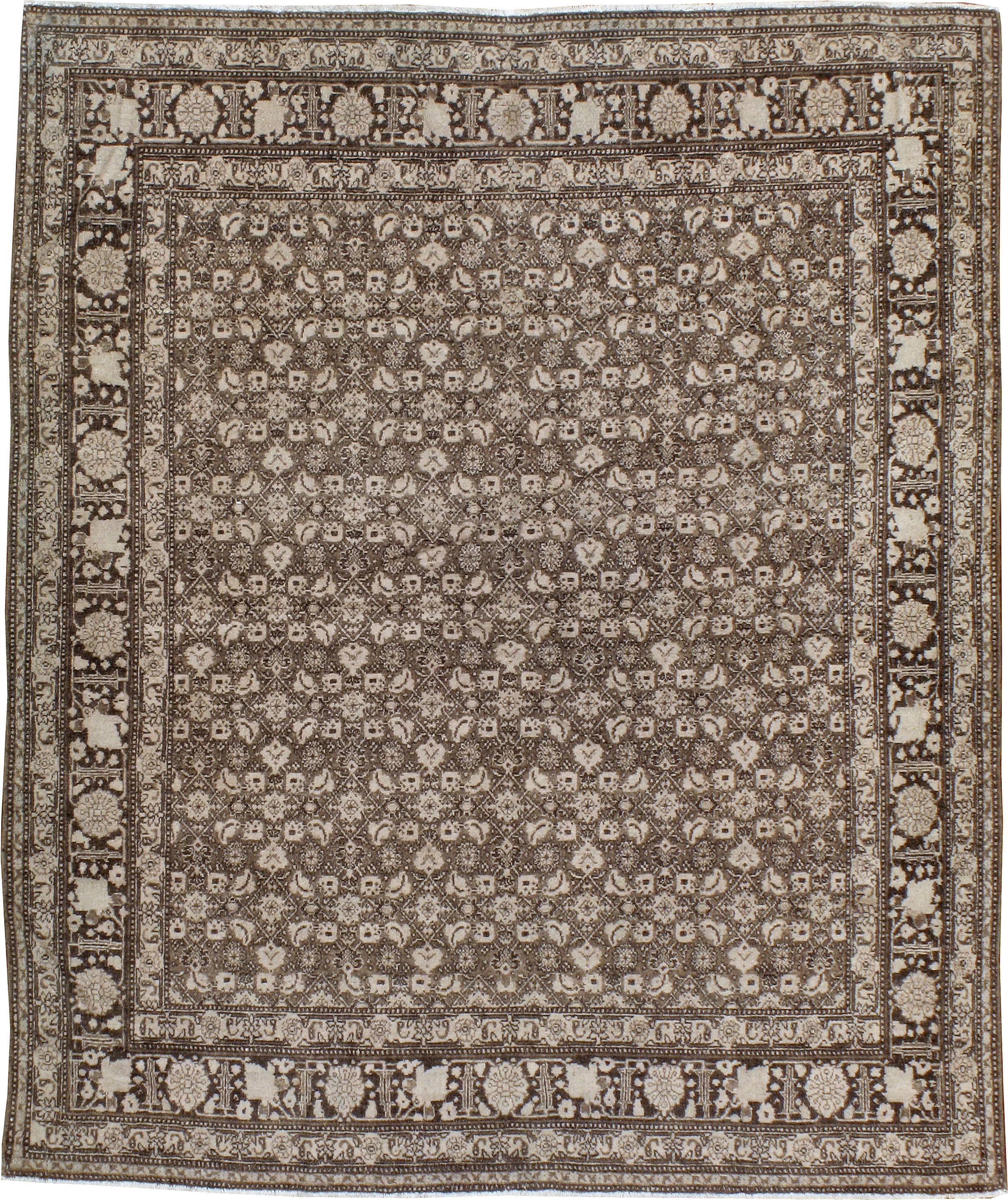 An antique Persian Senneh Tabriz carpet from the first quarter of the 20th century.