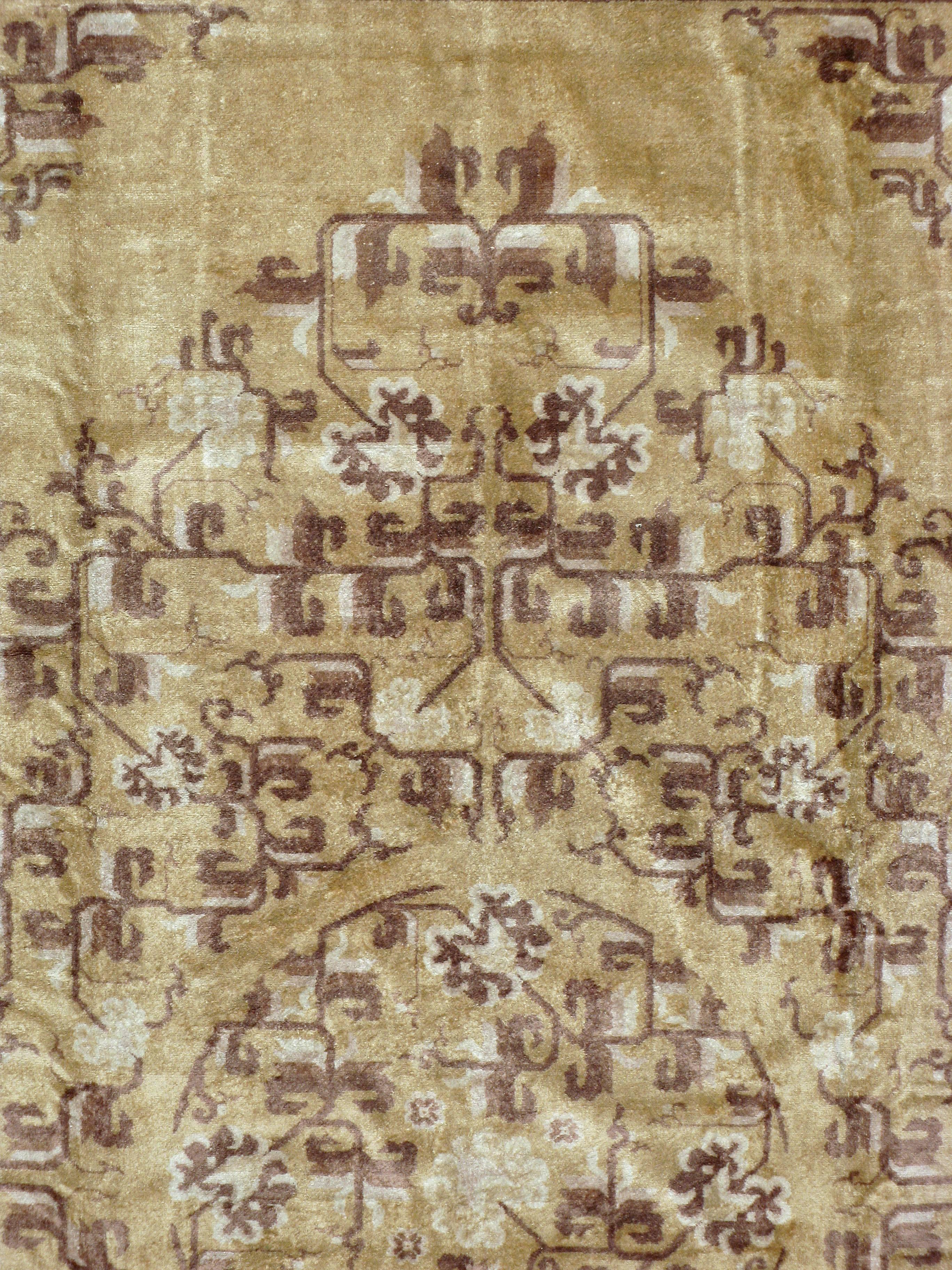 A vintage silk Chinese carpet from the mid-20th century.
