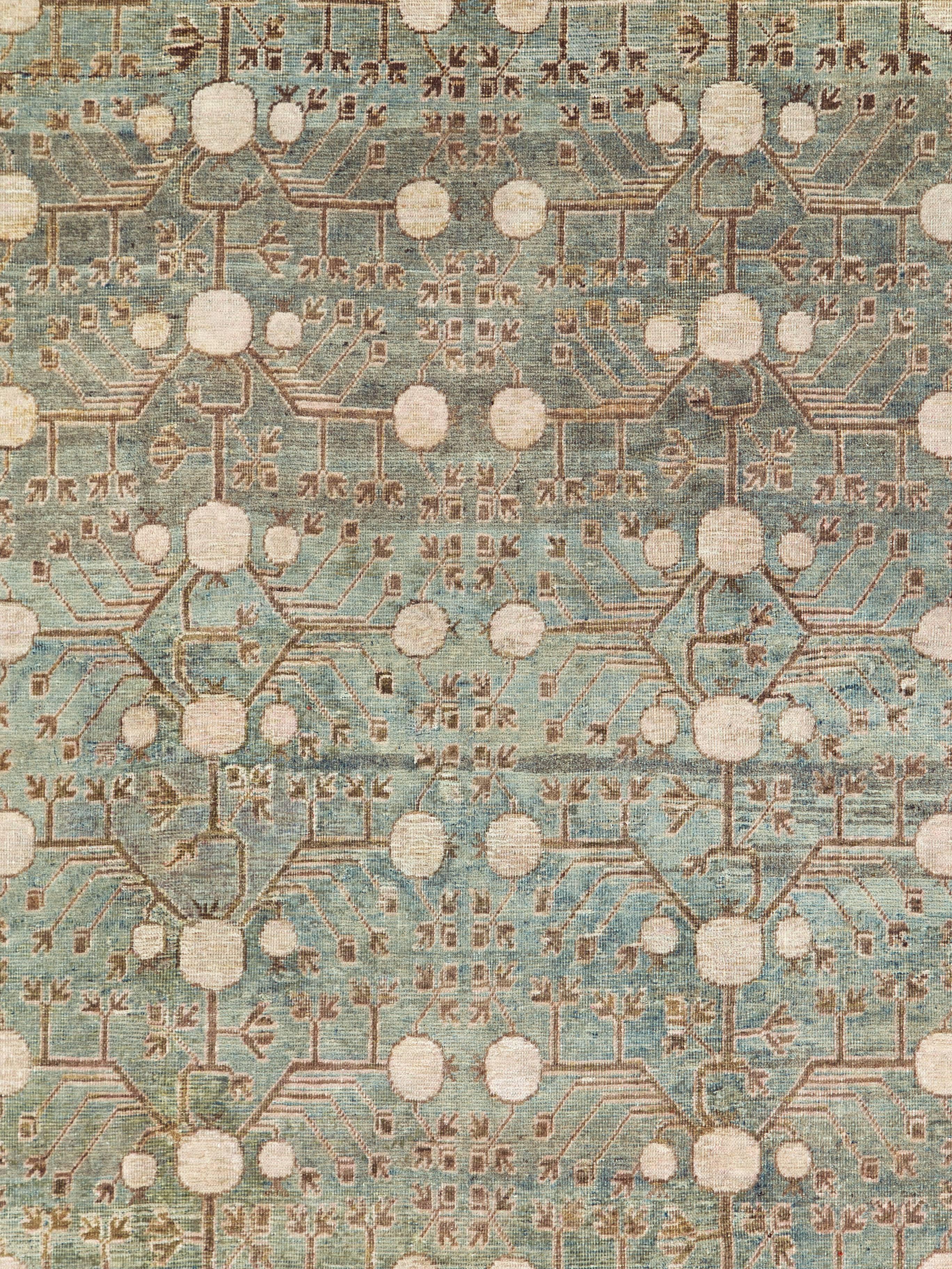 An antique East Turkestan Khotan rug from the early 20th century.