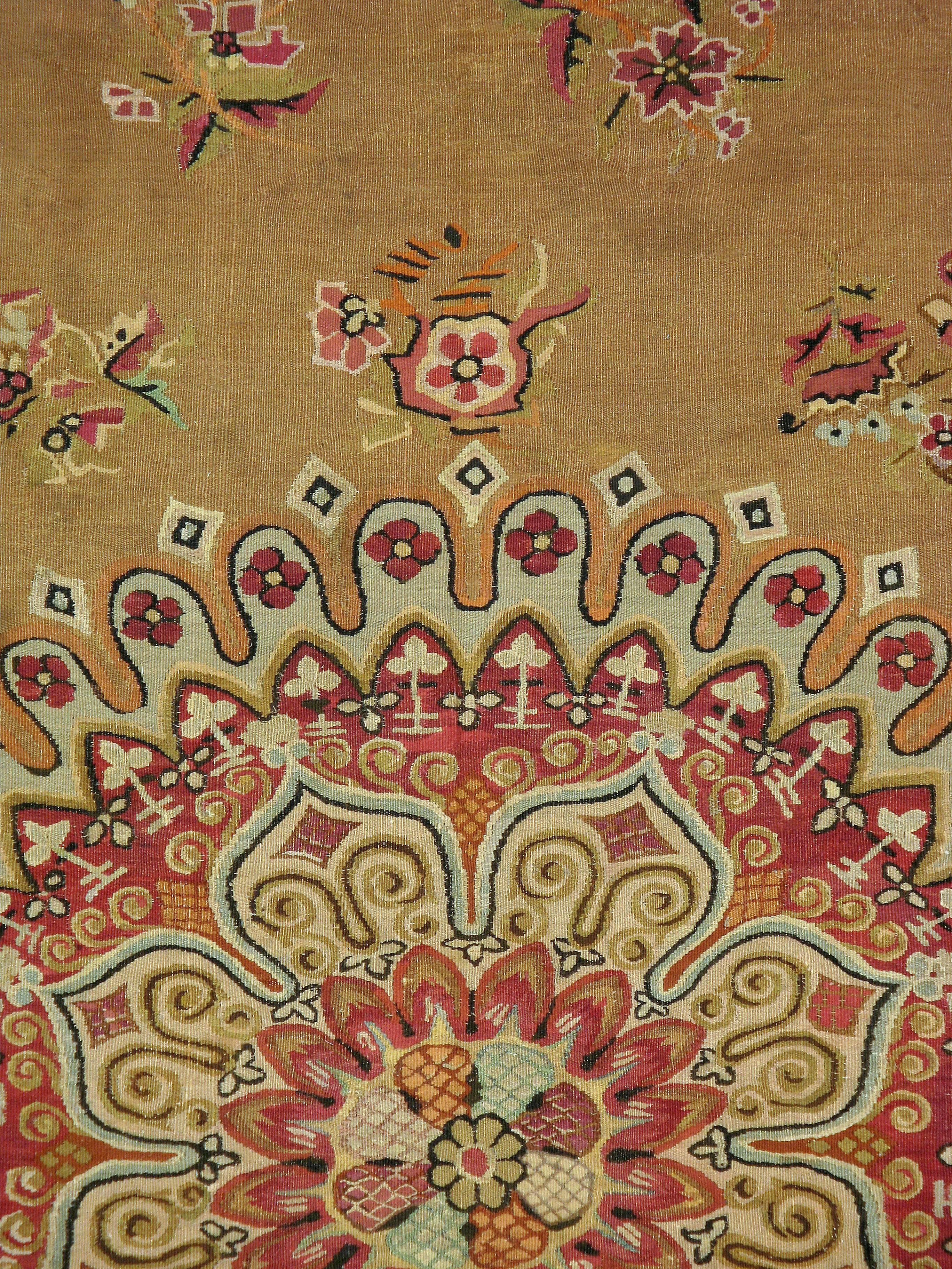 An antique flat-woven French Aubusson carpet from the turn of the 20th century.