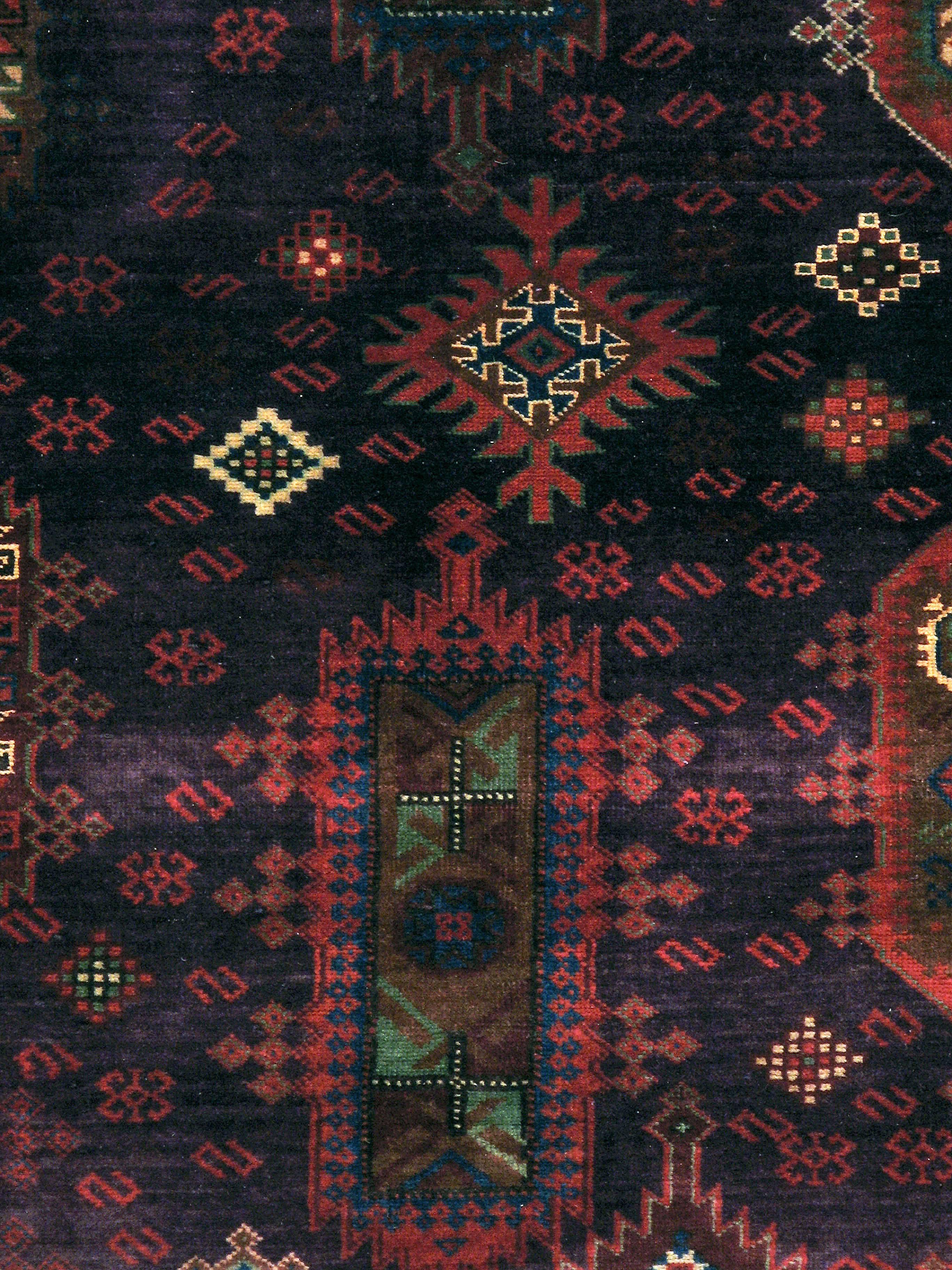 An antique Indian Agra carpet from the second quarter of the 20th century.