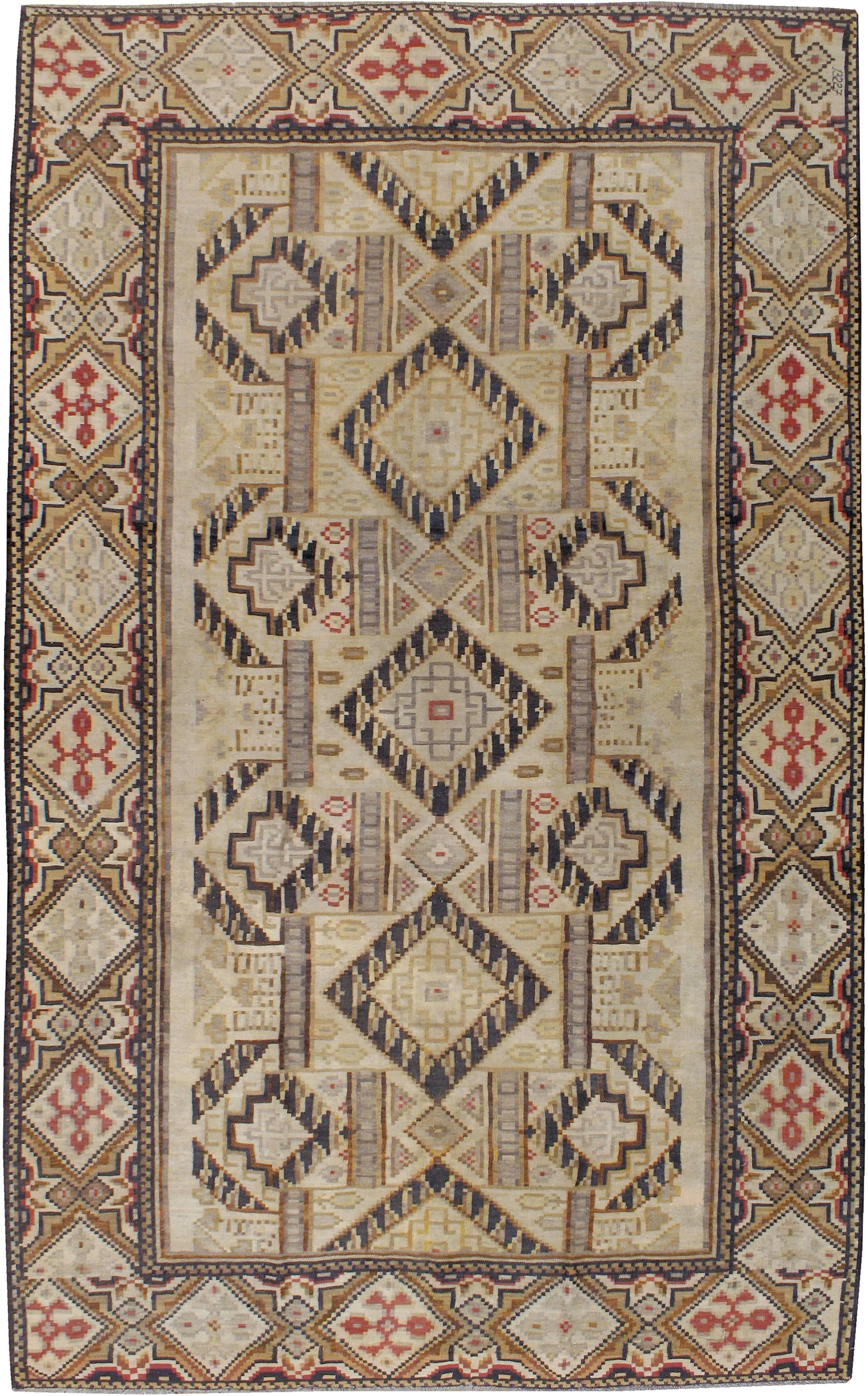 An antique Russian Bessarabian flat-woven Kilim carpet from the first quarter of the 20th century.