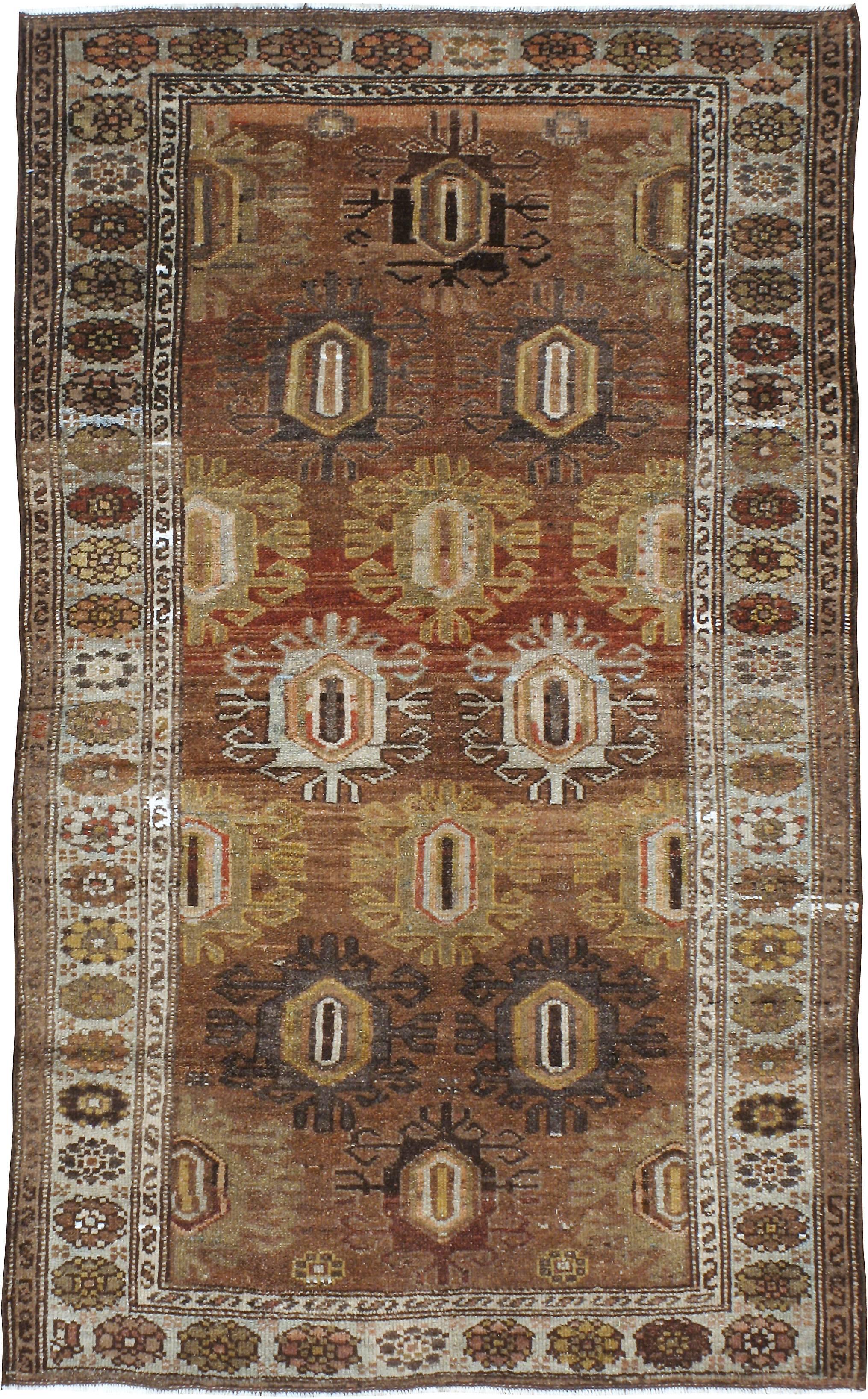 An antique Persian Kurd carpet from the first quarter of the 20th century.