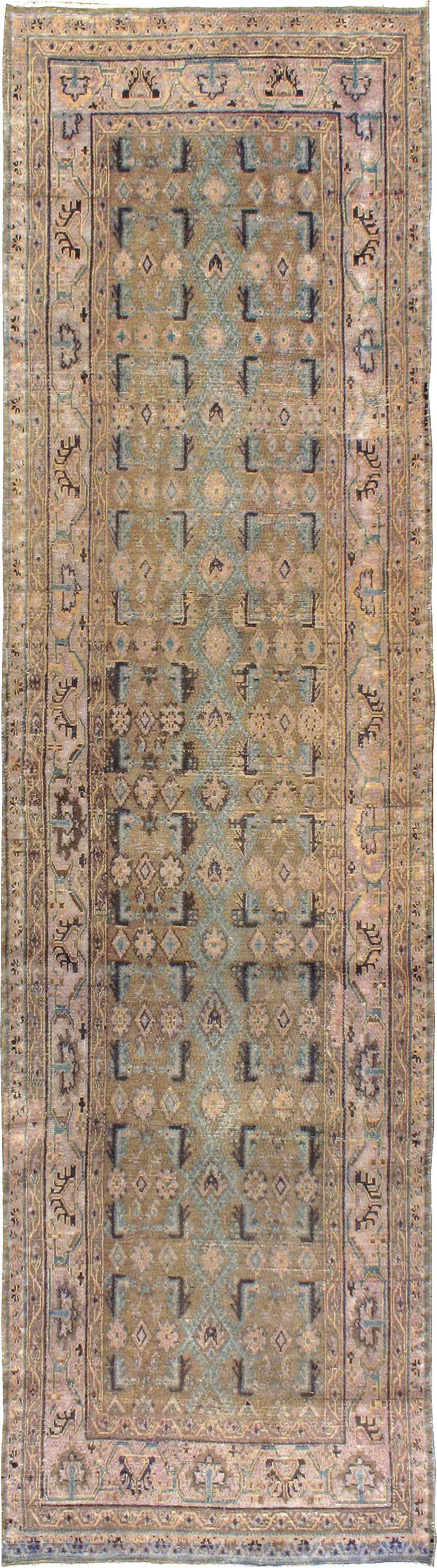 An antique Persian Malayer rug from the second quarter of the 20th century.