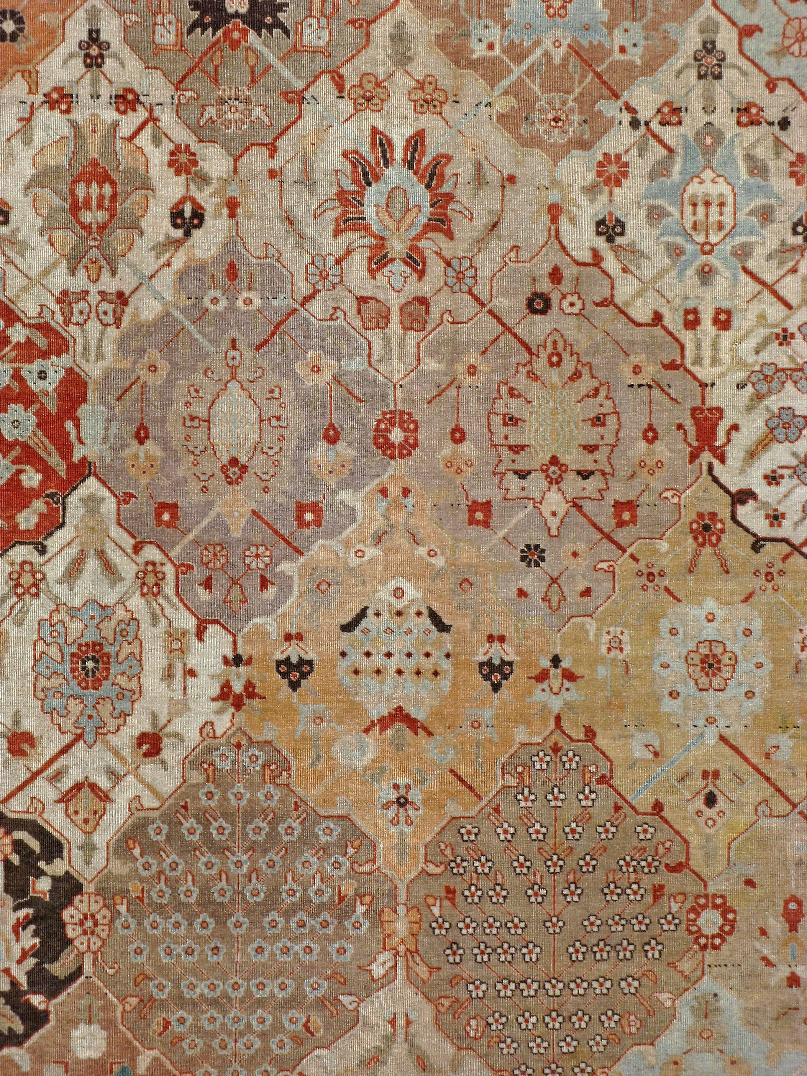 Un Tabriz perse du début du 20ème siècle. Depuis le XVIIe siècle, l'Iran a commencé à exporter des tapis artisanaux dans le monde entier, notamment en Europe. Les artistes utilisaient l'une des trois versions de métiers à tisser verticaux, plus tard